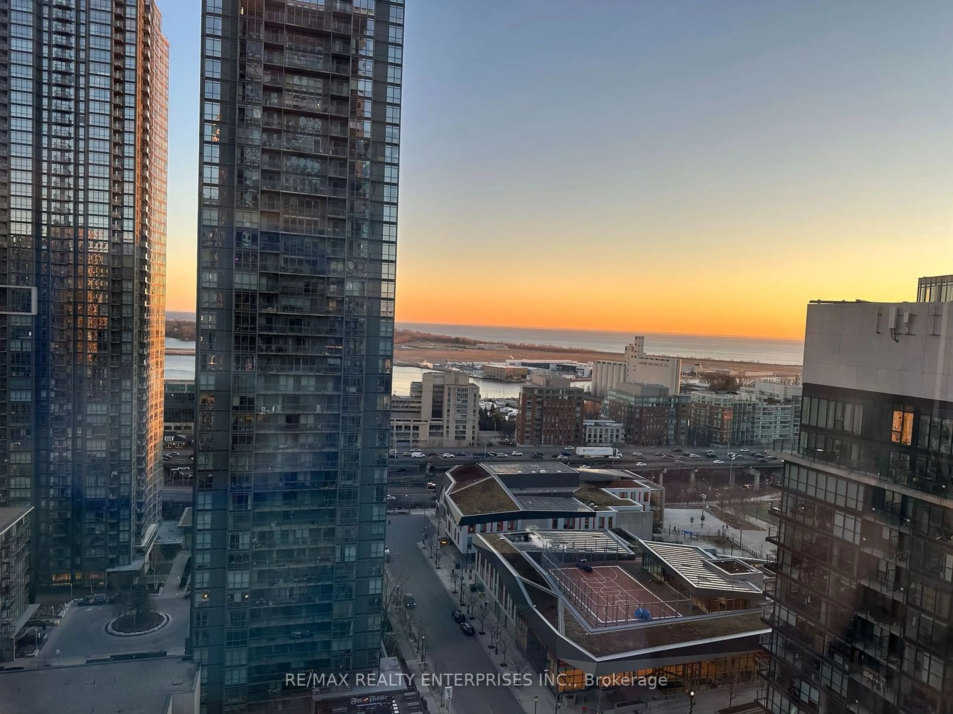 A pic from outside/outdoor area/front of a property/back of a property/a pic from drone, city buildings view from balcony for 25 Telegram Mews #2507, Toronto Ontario M5V 3Z1