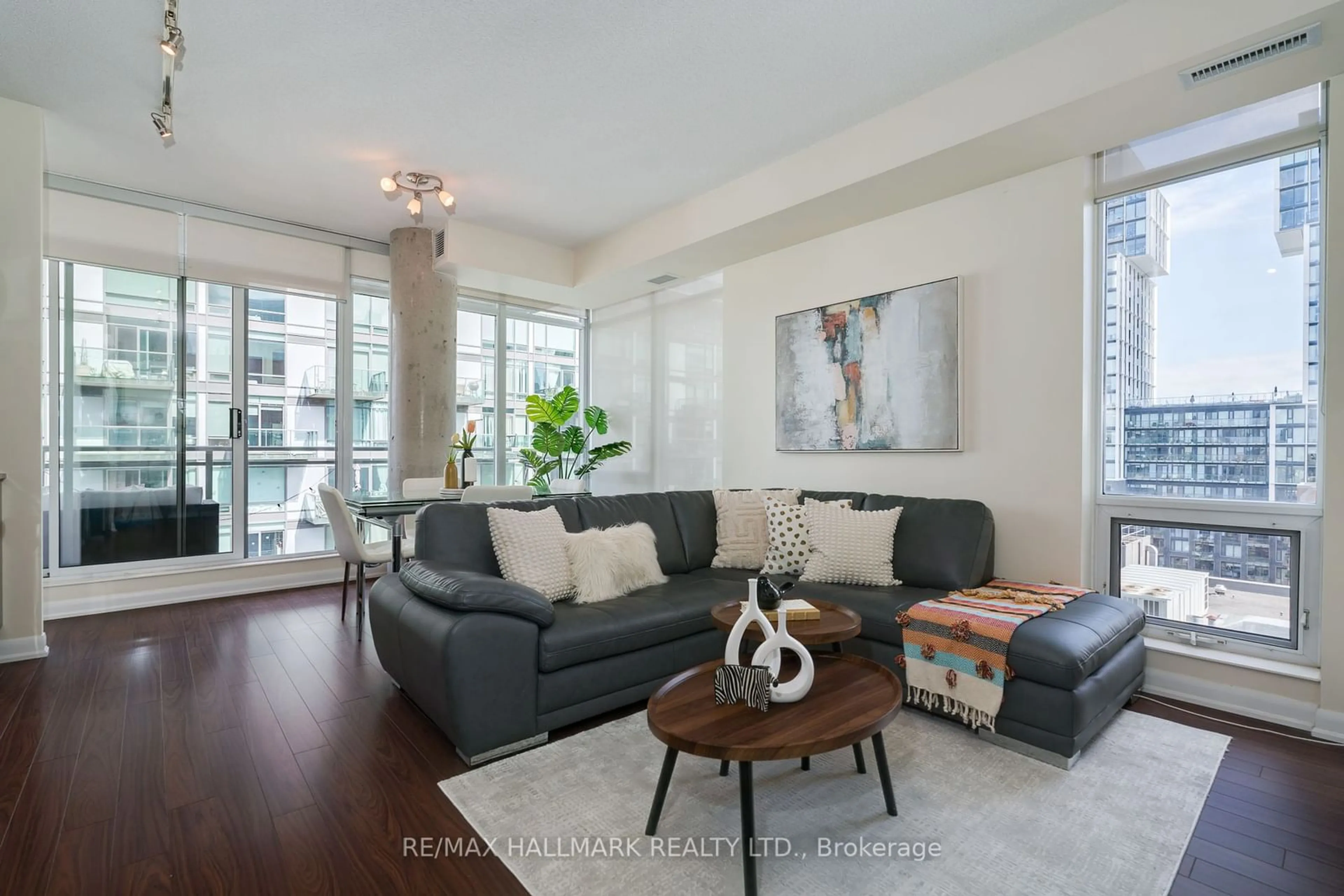 Living room with furniture, wood/laminate floor for 205 Frederick St #1210, Toronto Ontario M5A 4V3