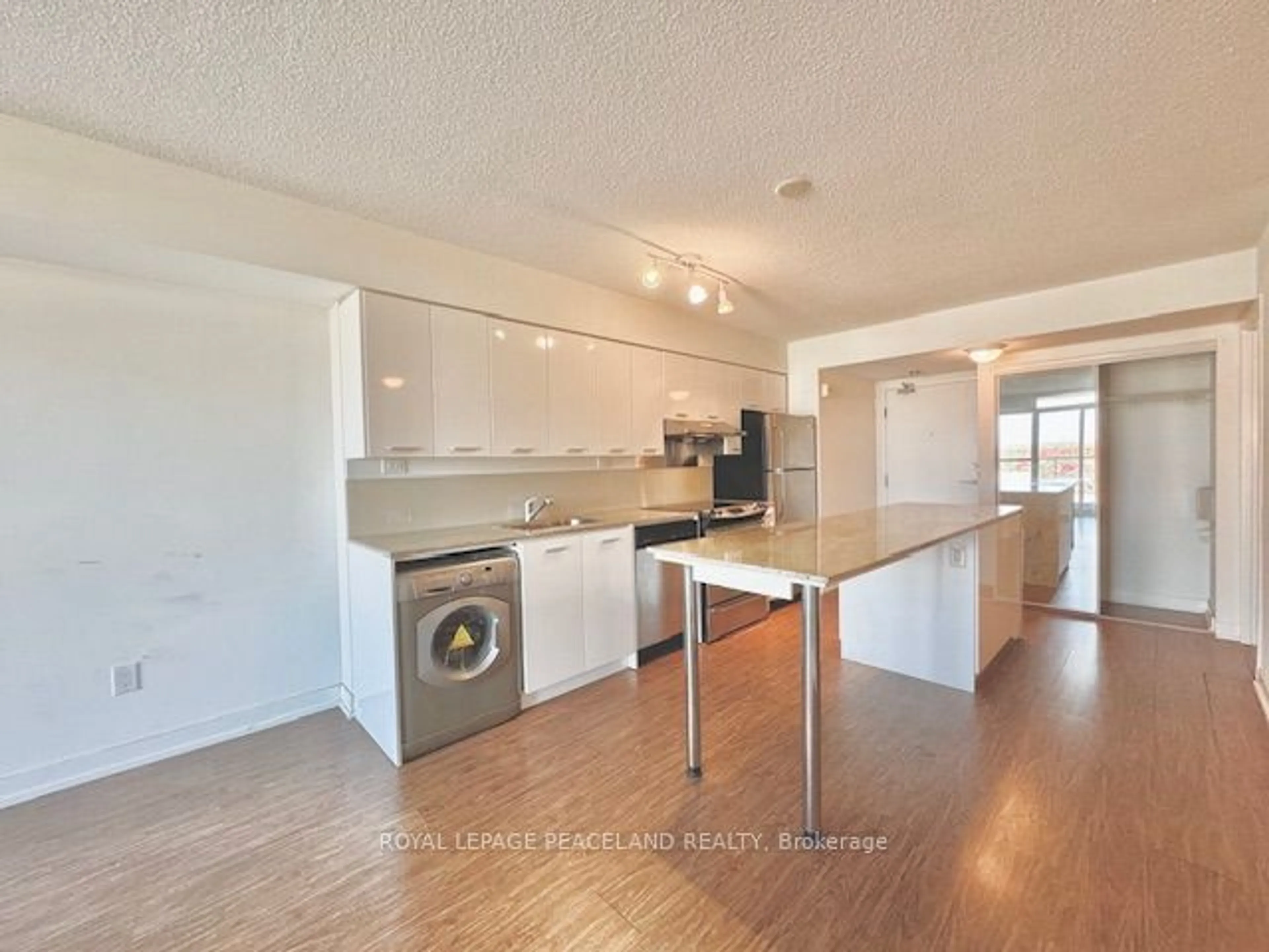 Open concept kitchen, wood/laminate floor for 29 Singer Crt #1008, Toronto Ontario M2K 0B3