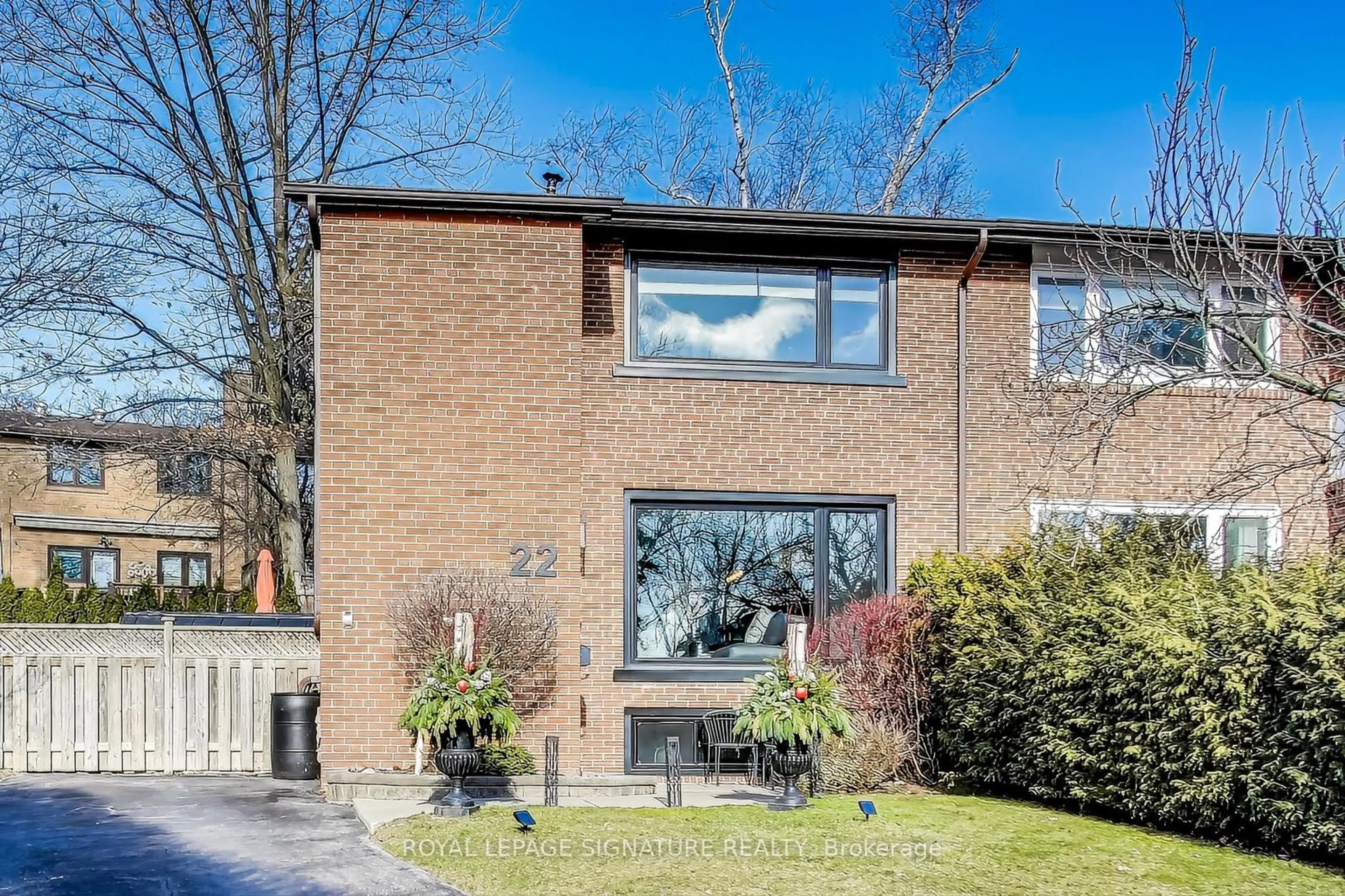 Home with brick exterior material, street for 22 Ballymena Crt, Toronto Ontario M3C 2B9