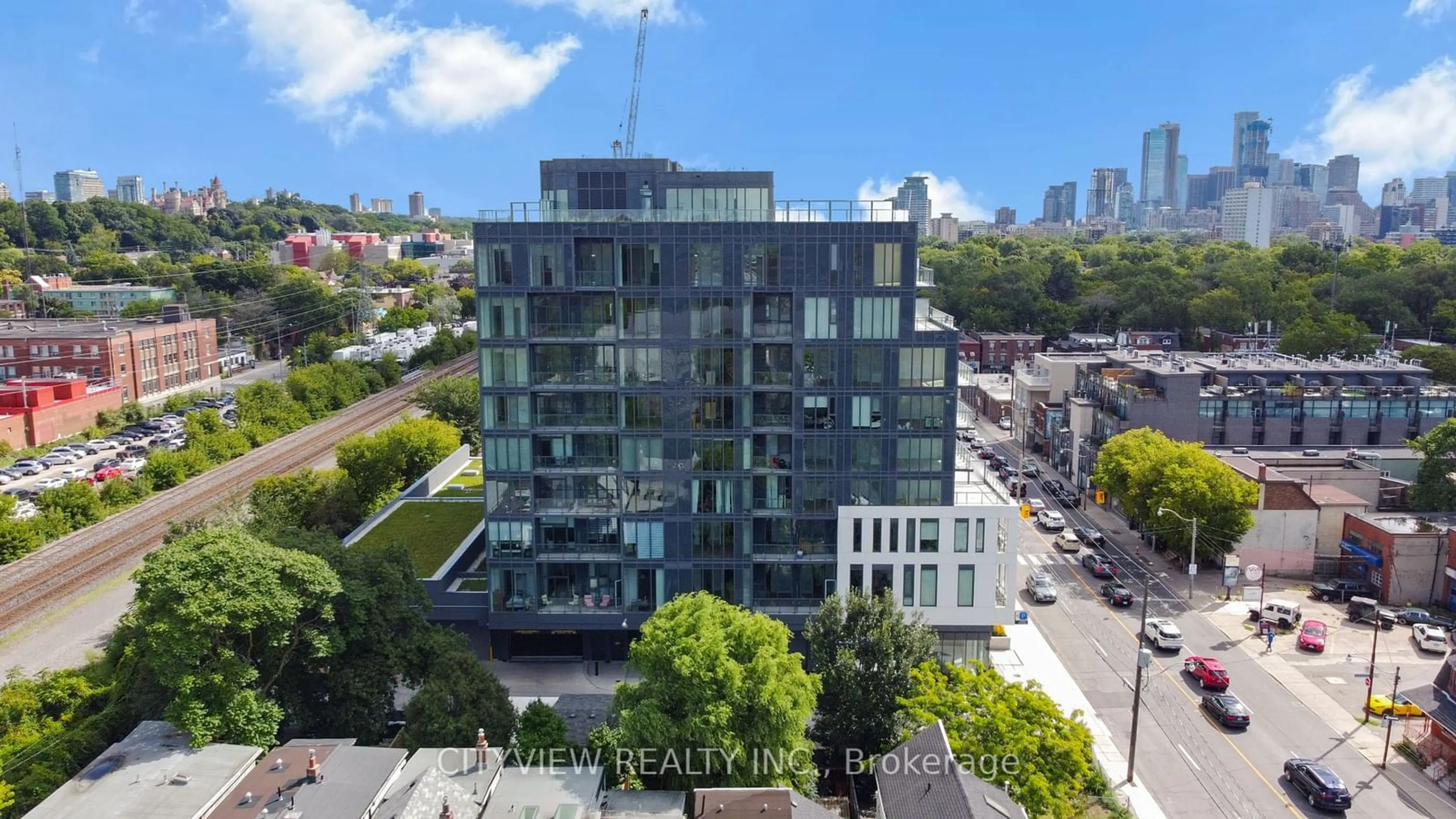 A pic from outside/outdoor area/front of a property/back of a property/a pic from drone, city buildings view from balcony for 500 Dupont St #PH10, Toronto Ontario M6G 1Y7