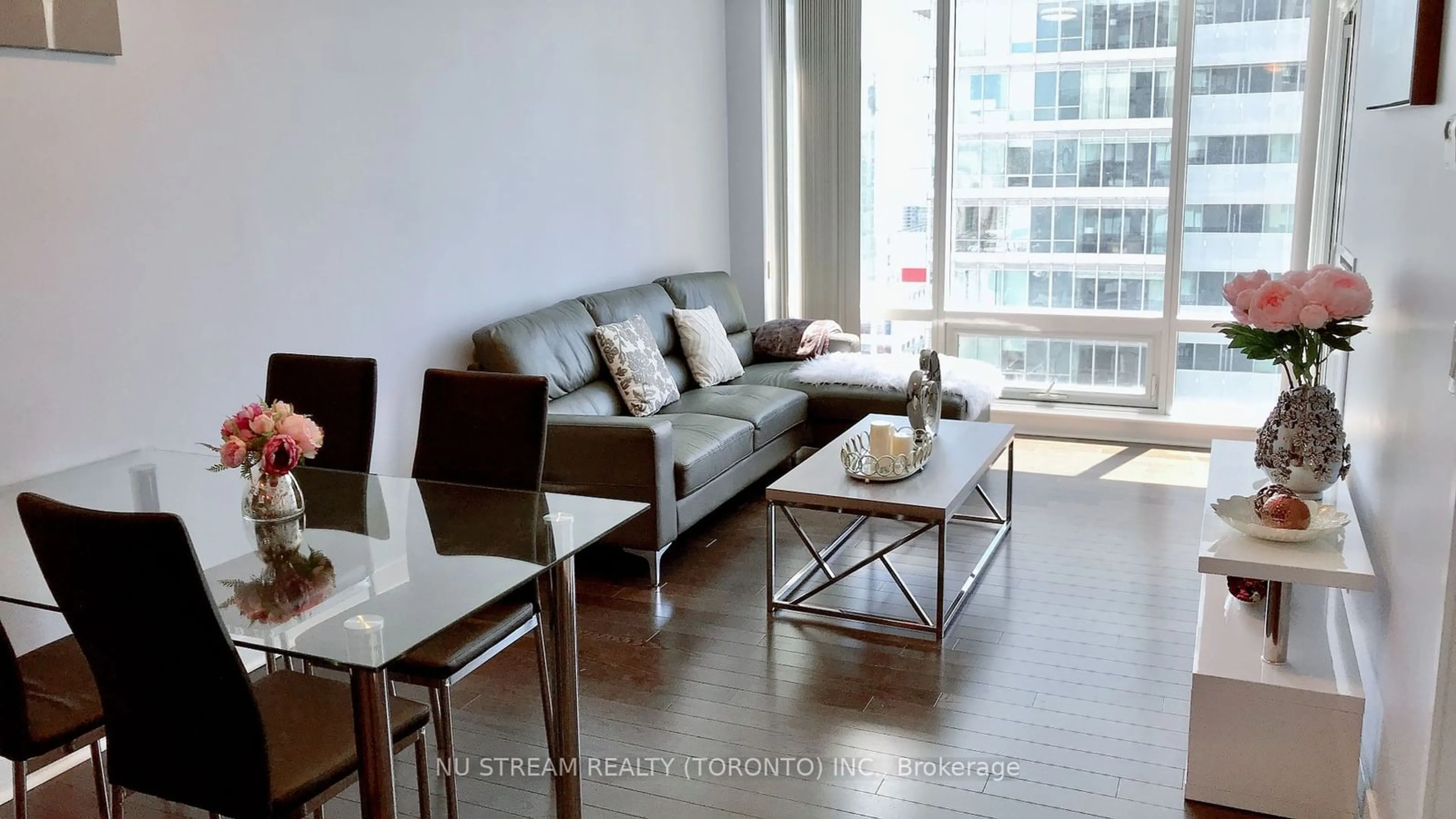 Living room with furniture, wood/laminate floor for 295 Adelaide St #3308, Toronto Ontario M5V 1P7