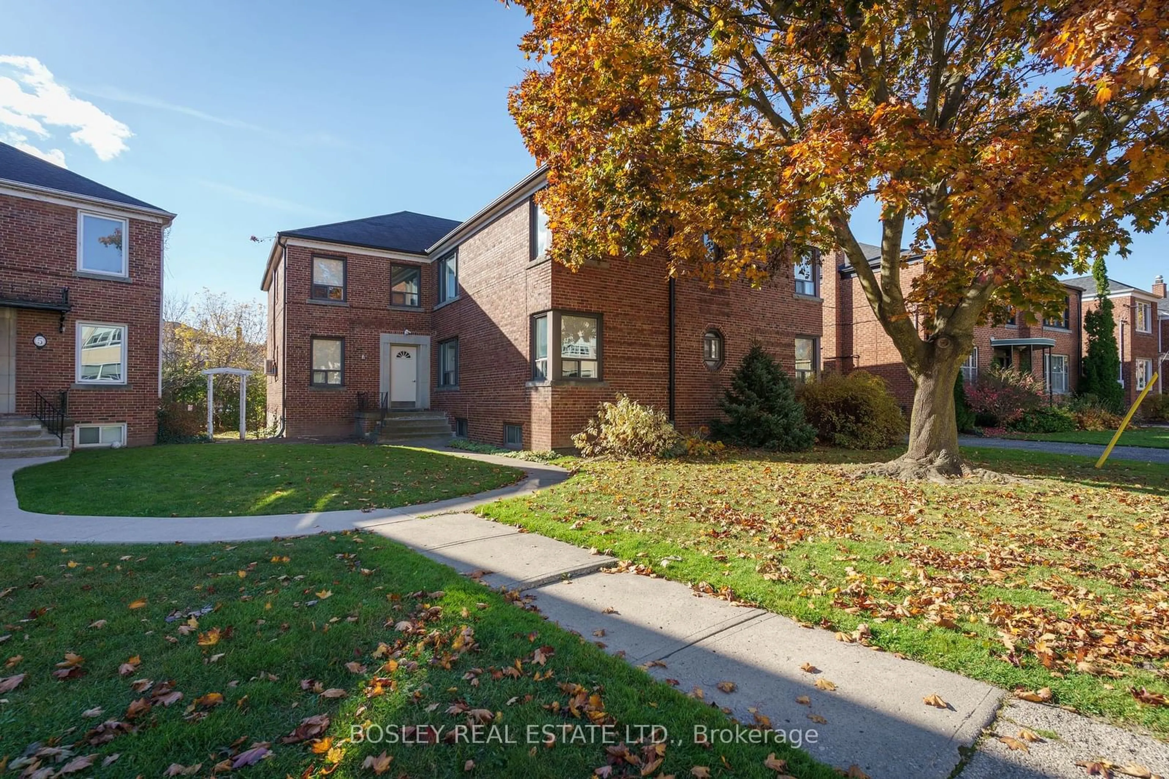 Home with brick exterior material, street for 7 Warwick Ave #2, Toronto Ontario M6C 1T5