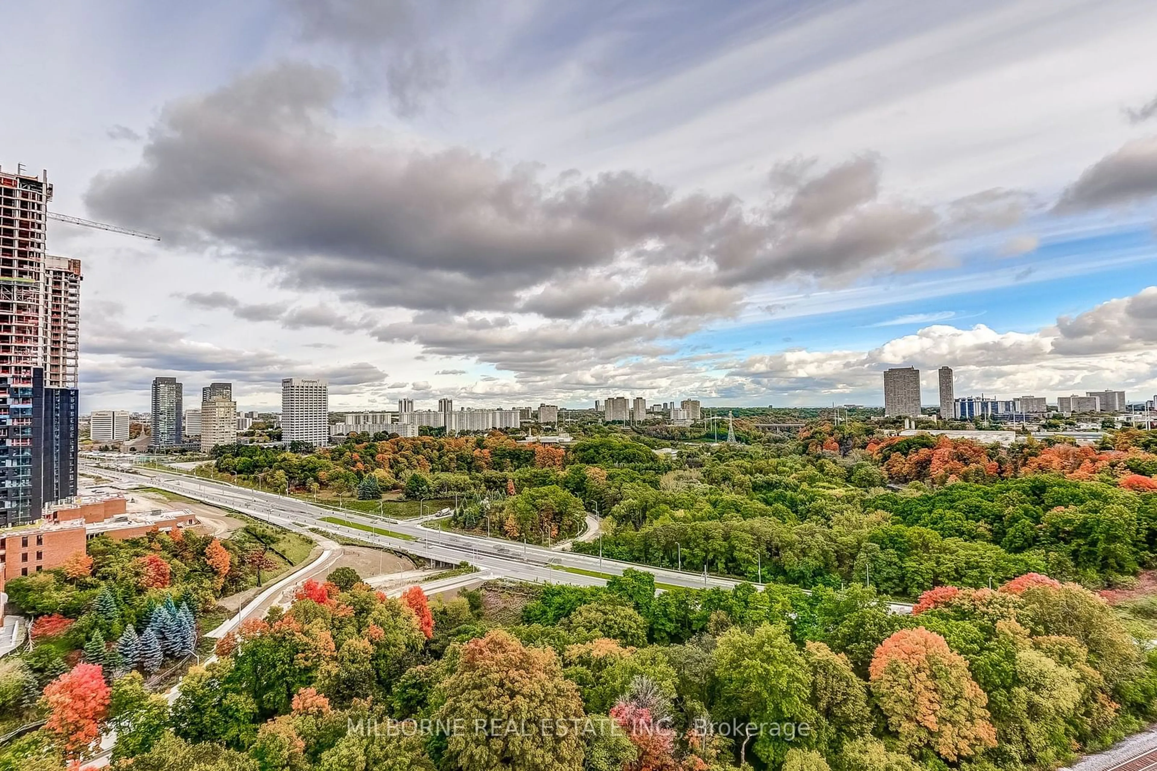 A pic from outside/outdoor area/front of a property/back of a property/a pic from drone, city buildings view from balcony for 30 Inn On The Park Dr #1607, Toronto Ontario M3C 0P7