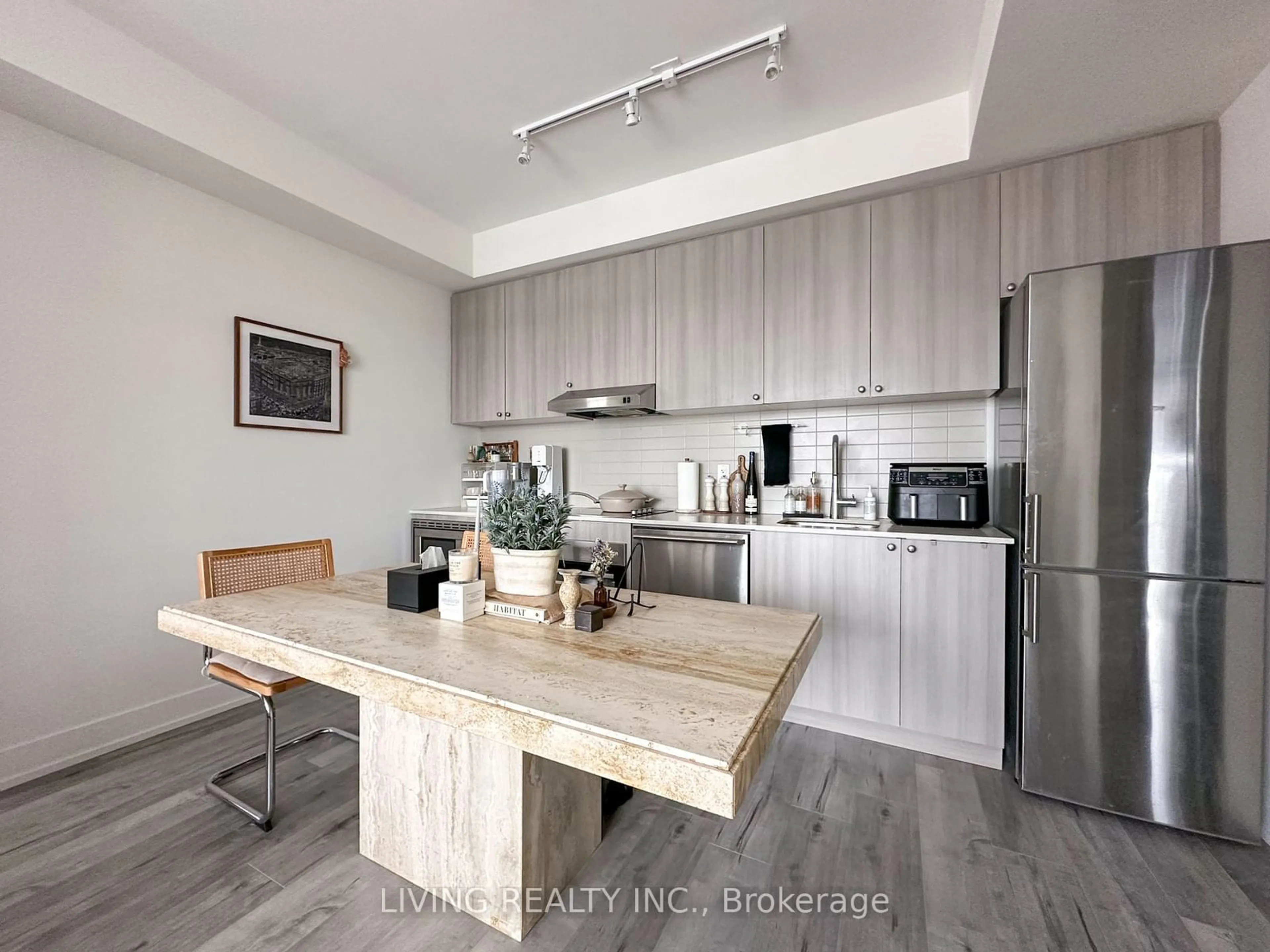 Open concept kitchen, wood/laminate floor for 7 Kenaston Gdns #1003, Toronto Ontario M2K 0E9