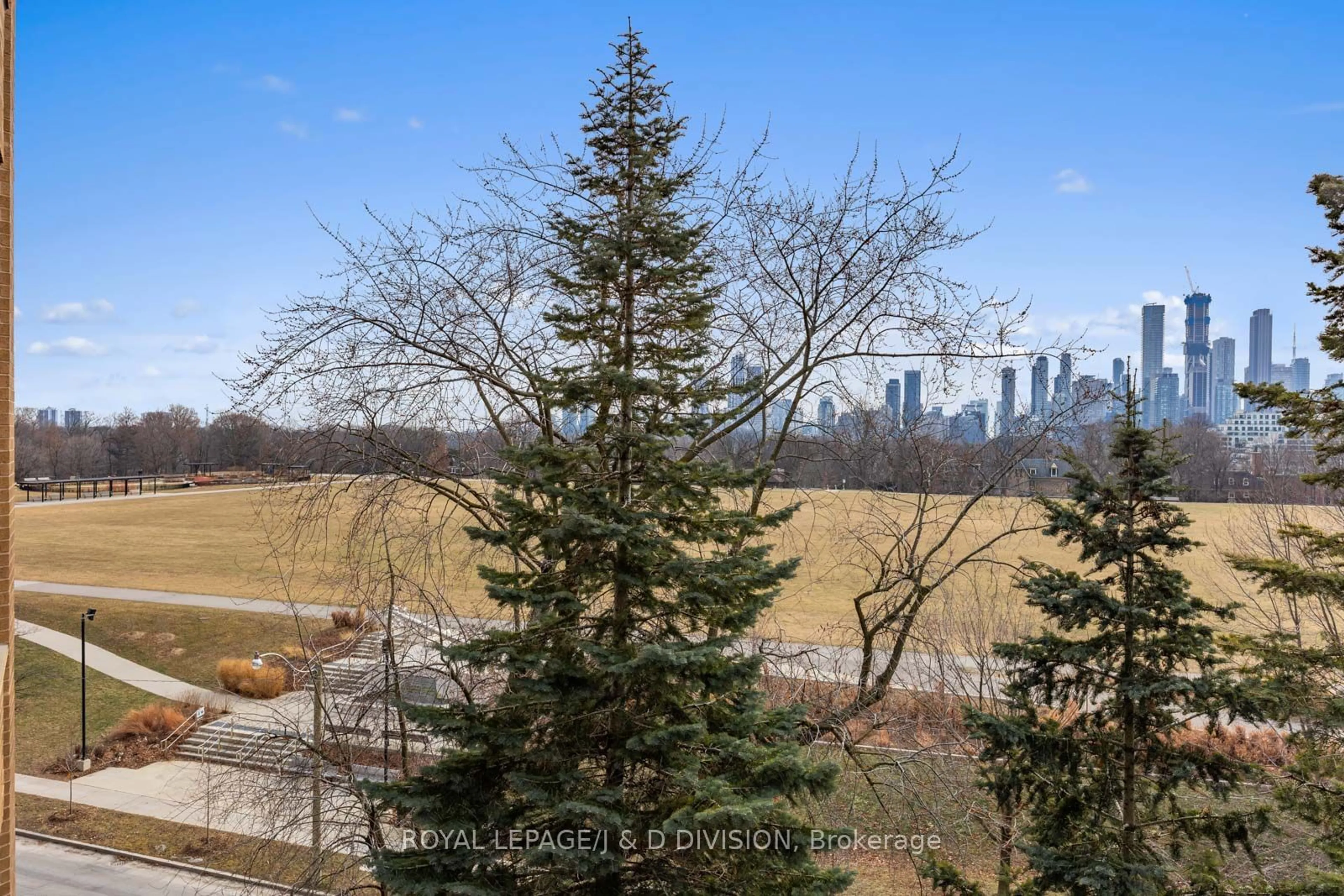 A pic from outside/outdoor area/front of a property/back of a property/a pic from drone, forest/trees view for 70 Rosehill Ave #501, Toronto Ontario M4T 1G6