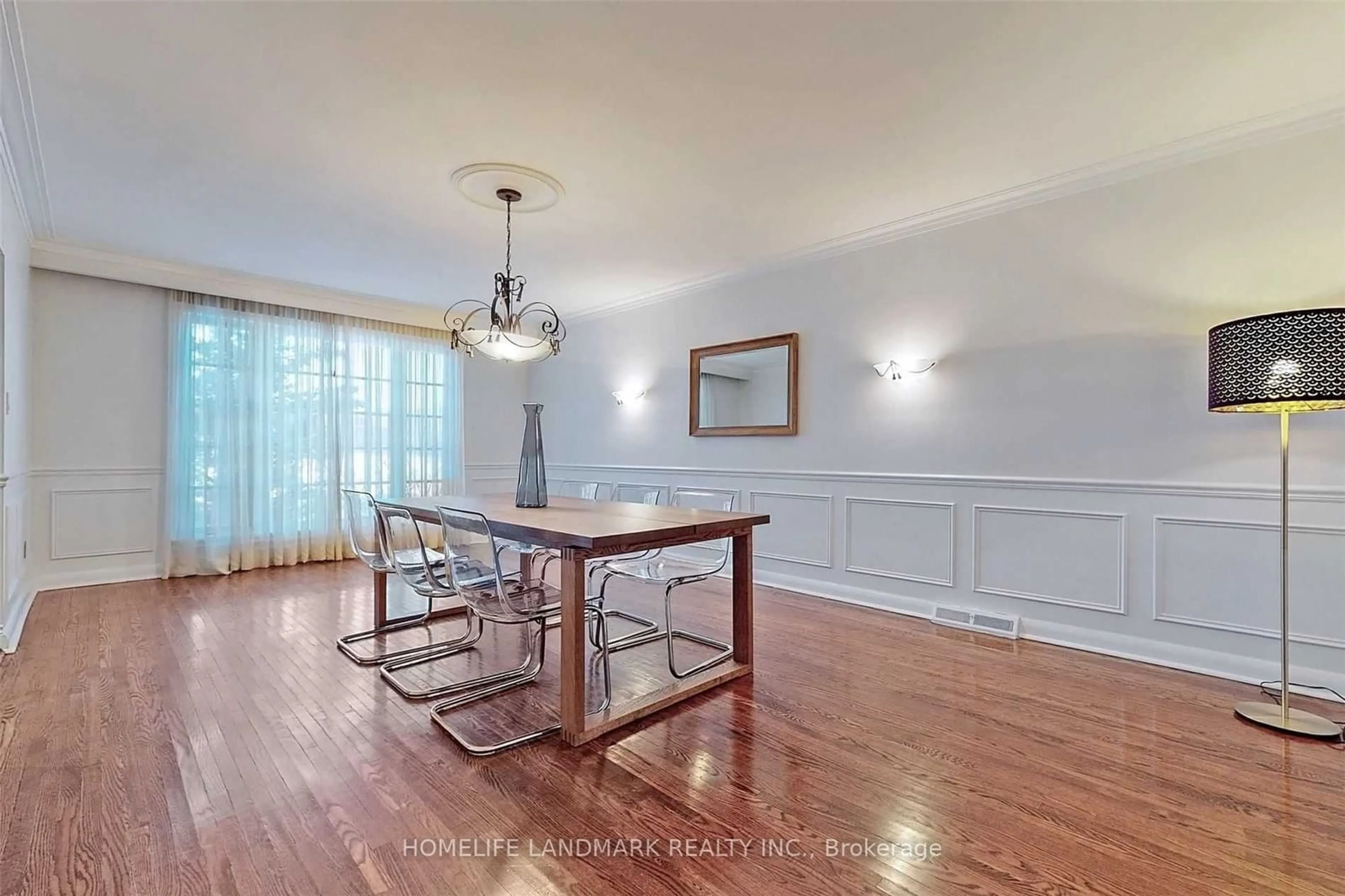 Dining room, wood/laminate floor for 177 Delhi Ave, Toronto Ontario M3H 1A7