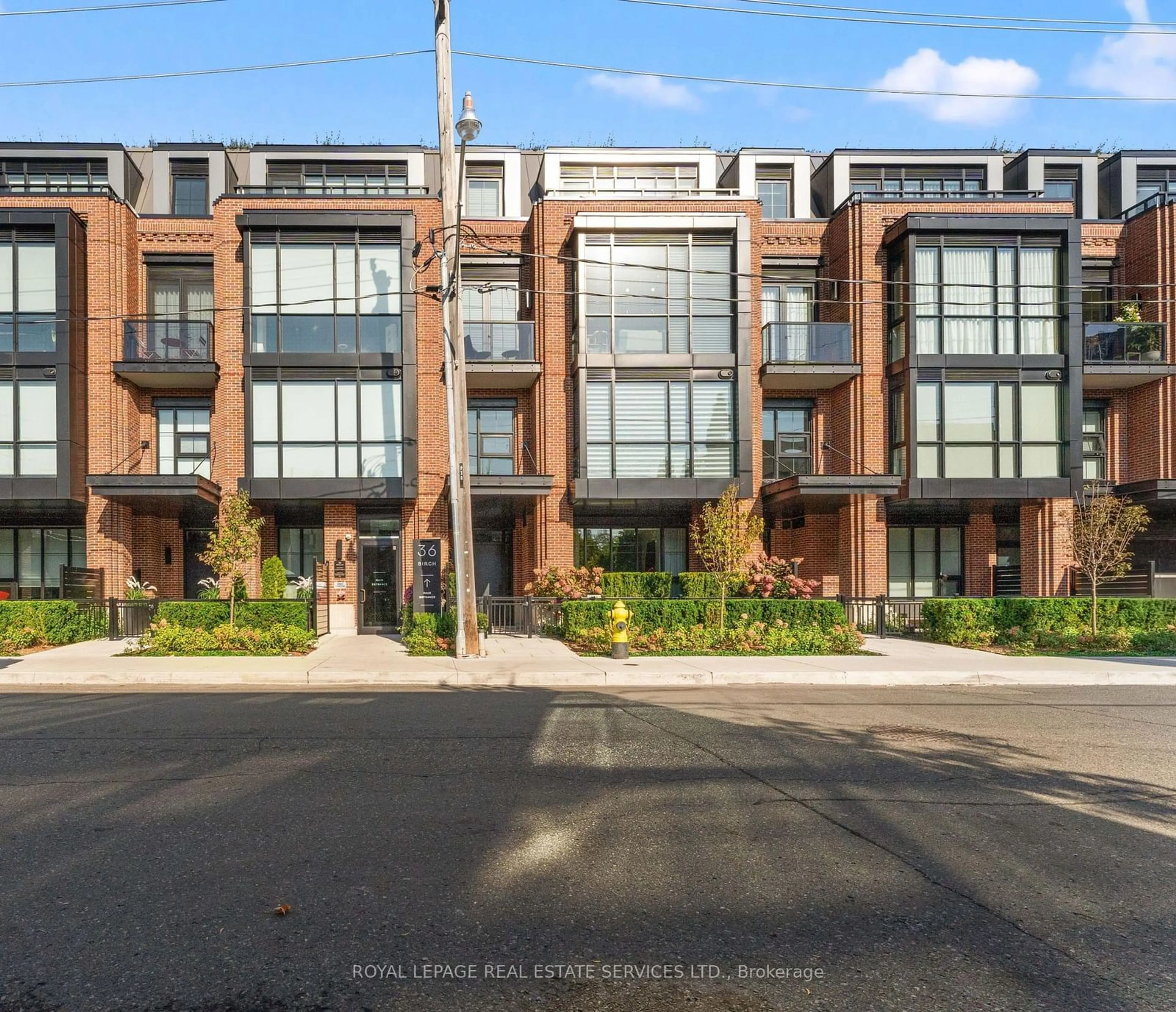 Home with brick exterior material, street for 36 Birch Ave #102, Toronto Ontario M4V 0B5