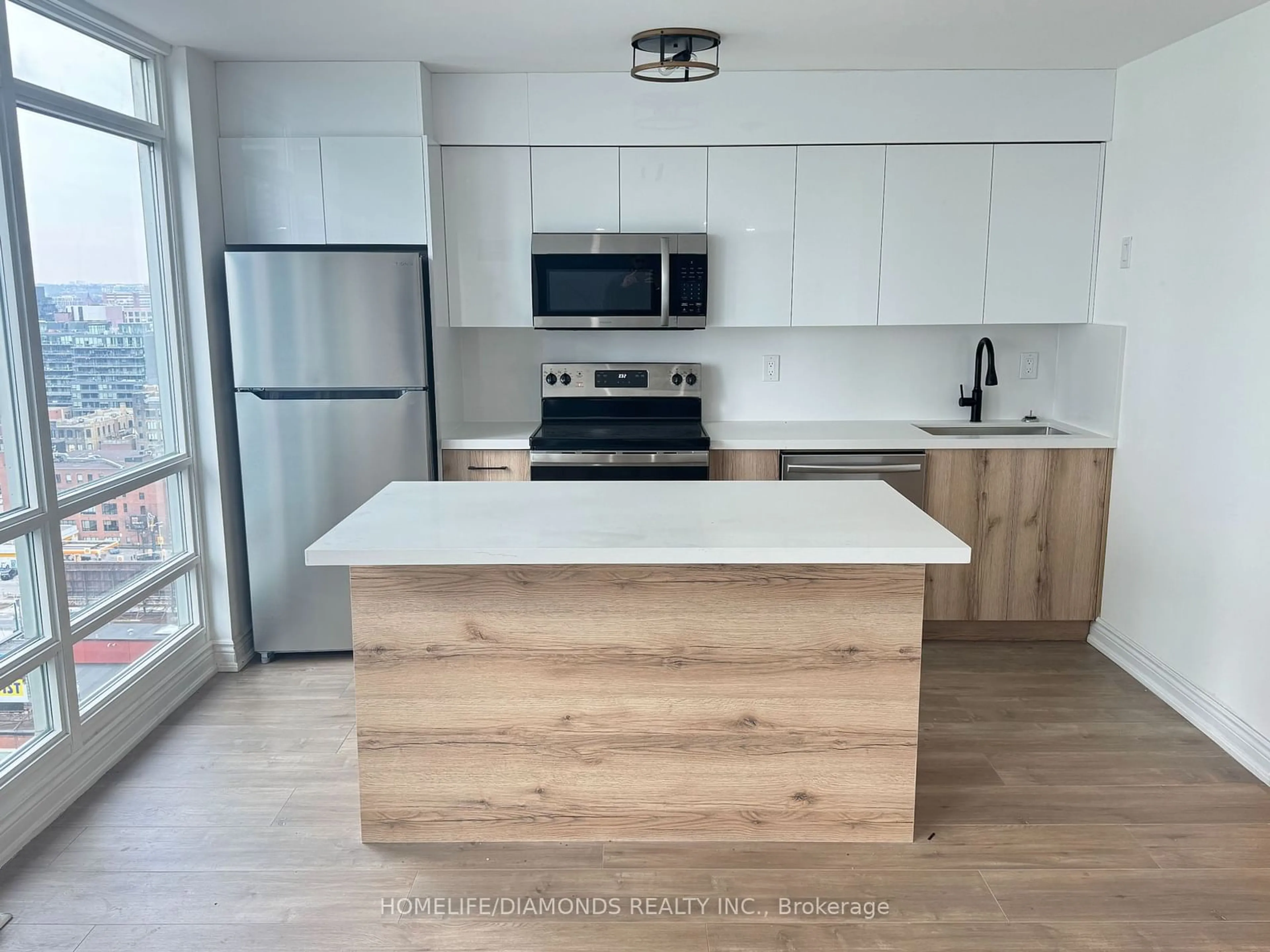 Open concept kitchen, wood/laminate floor for 381 FRONT St #2601, Toronto Ontario M5V 3R8