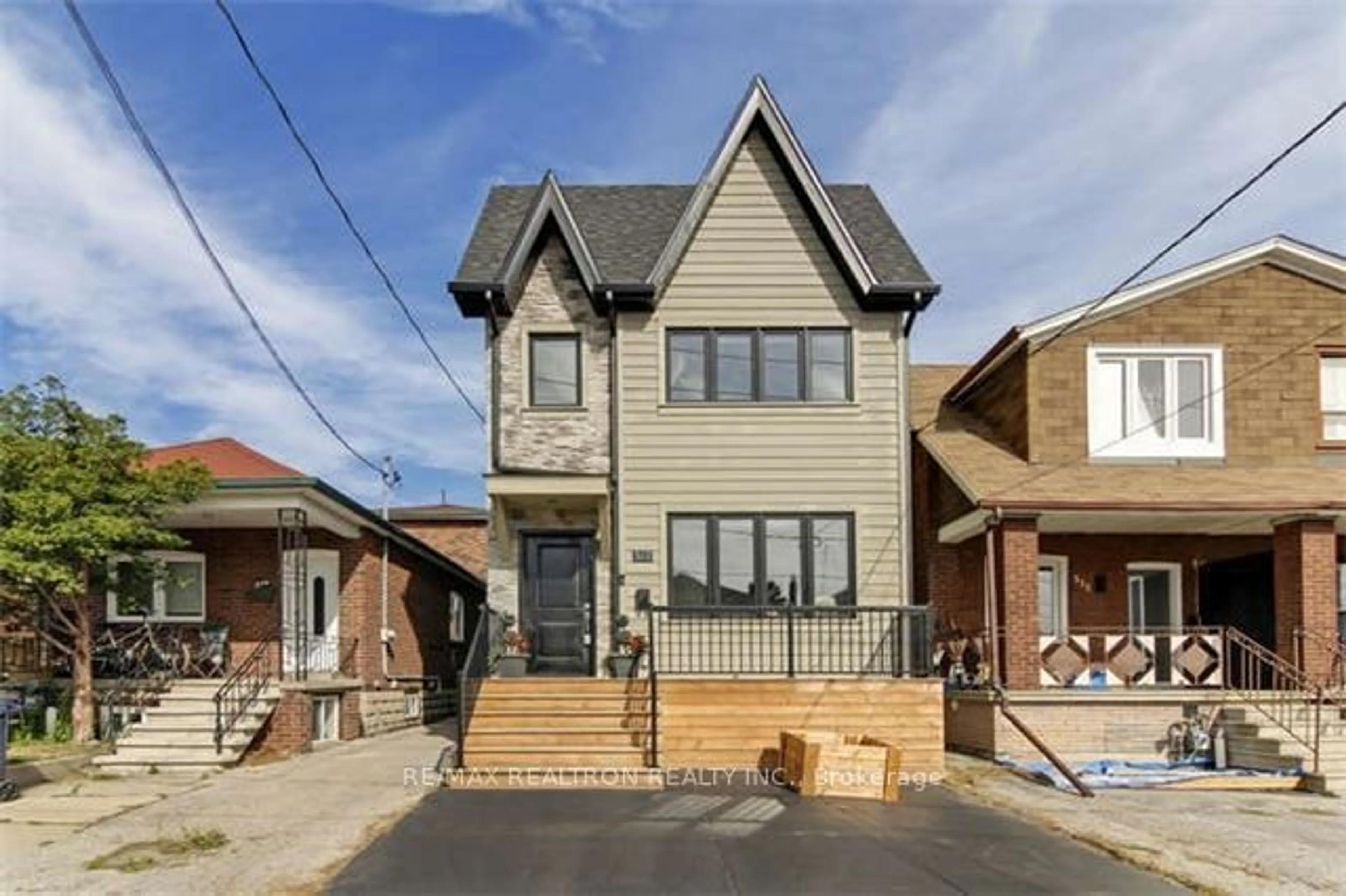 Home with brick exterior material, street for 517 Northcliffe Blvd, Toronto Ontario M6E 3L4