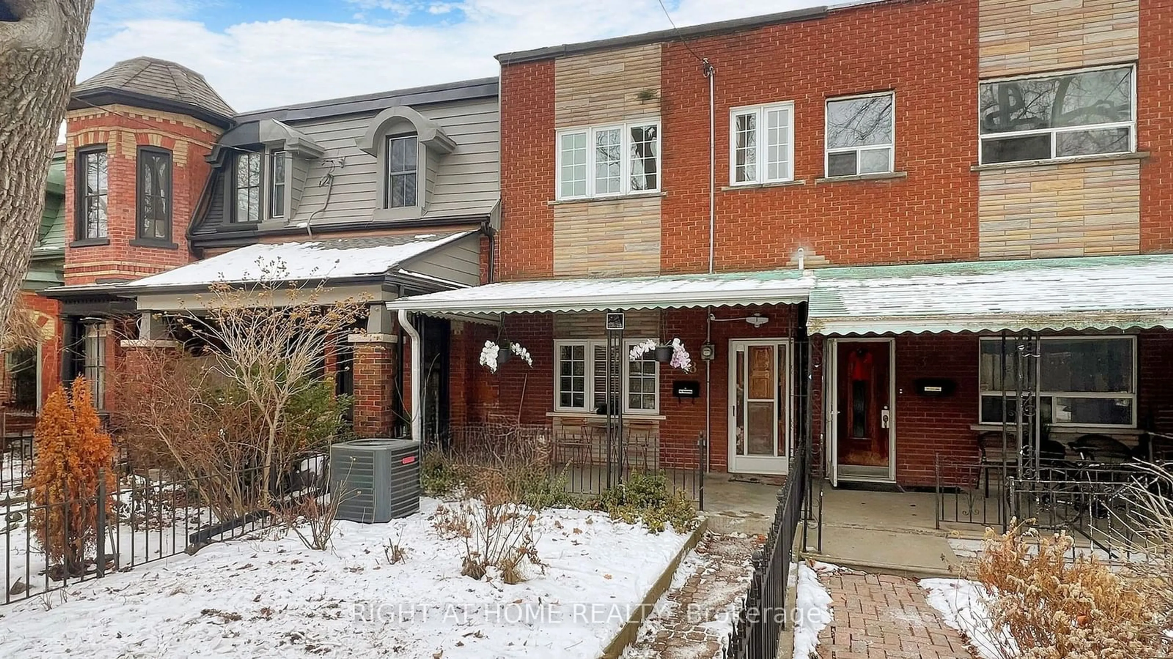 Home with brick exterior material, street for 28 Fennings St, Toronto Ontario M6J 3B8