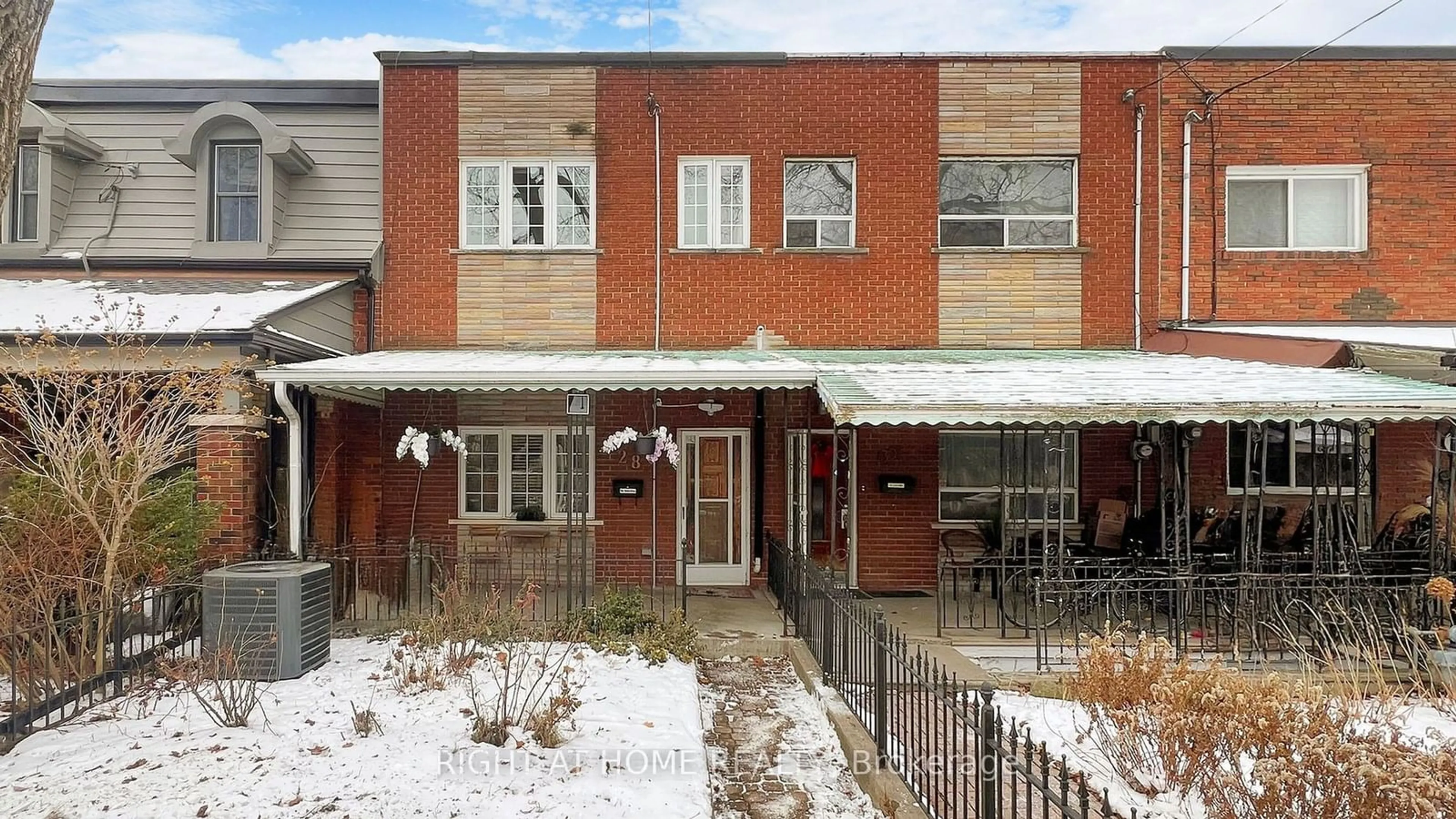 Home with brick exterior material, street for 28 Fennings St, Toronto Ontario M6J 3B8