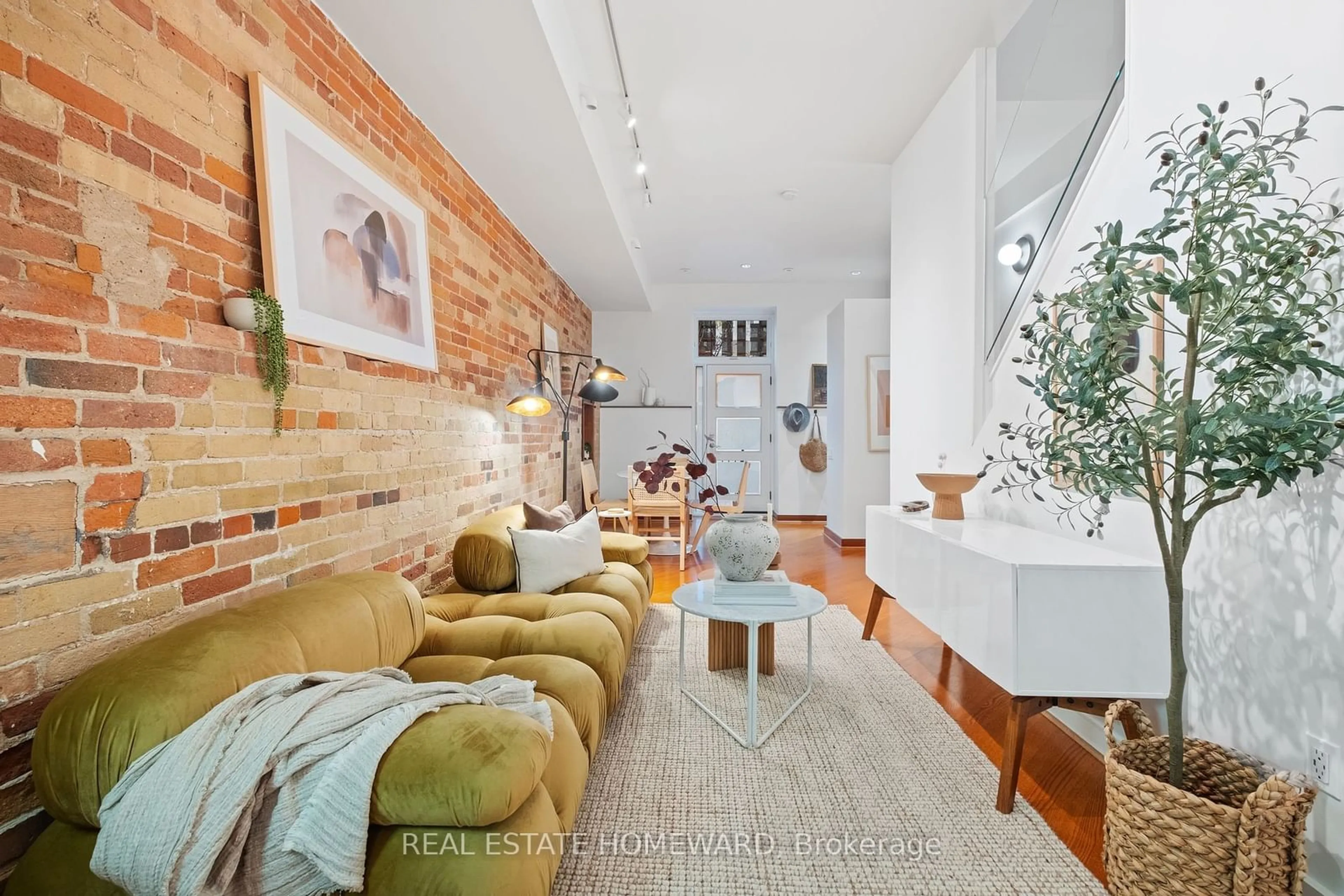 Living room with furniture, unknown for 27 Old Brewery Lane, Toronto Ontario M5A 3P2