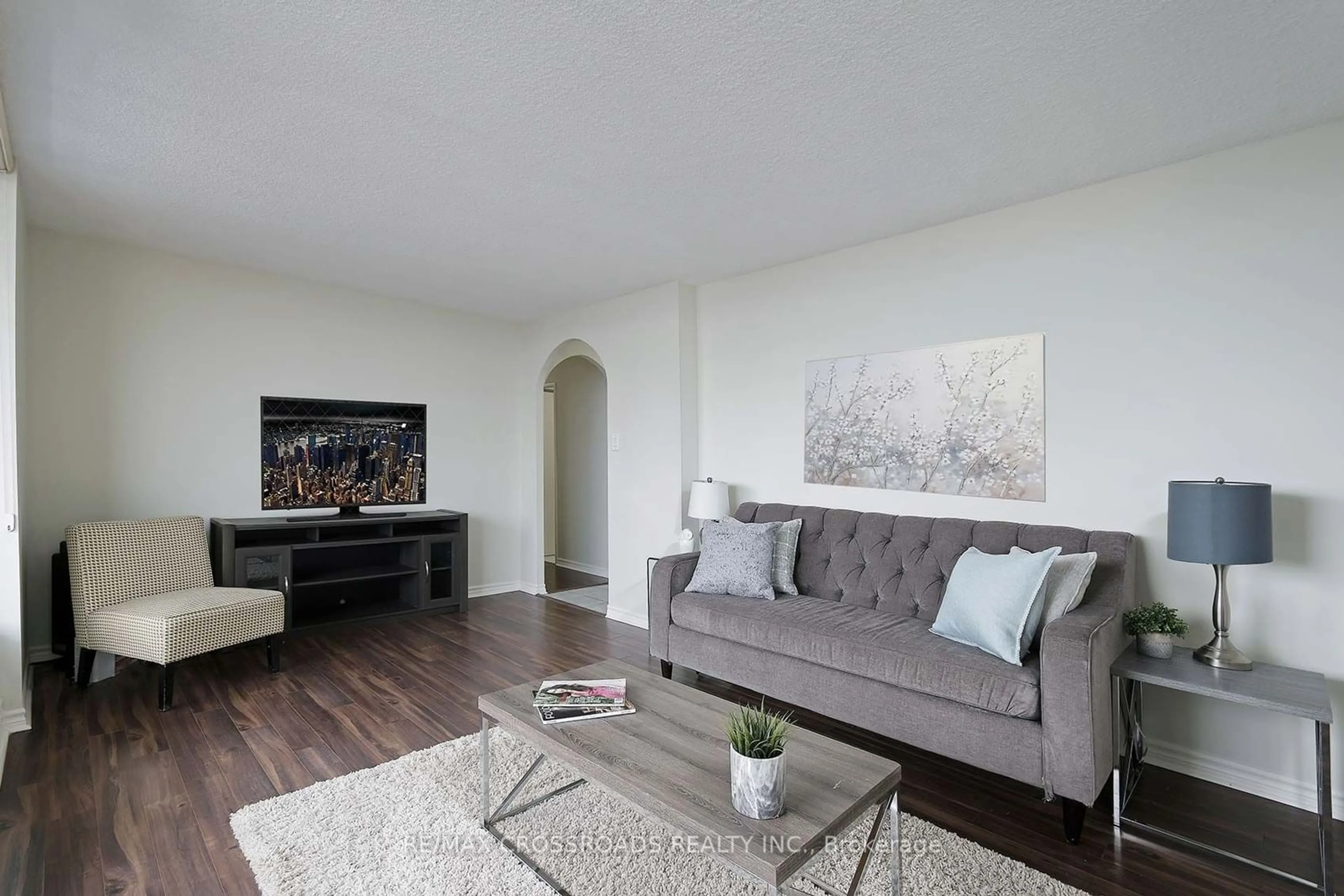 Living room with furniture, wood/laminate floor for 1900 Sheppard Ave #908, Toronto Ontario M2J 4T4