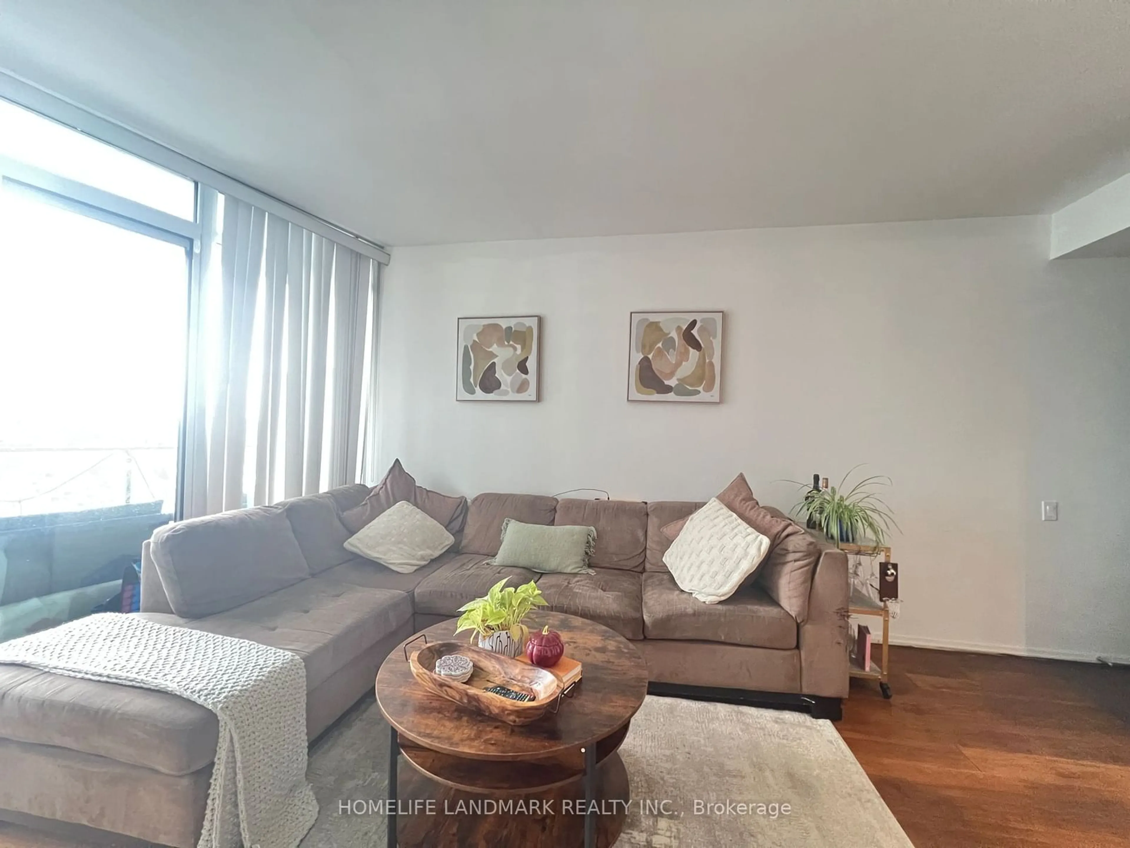 Living room with furniture, wood/laminate floor for 125 Peter St #2301, Toronto Ontario M5V 2G9