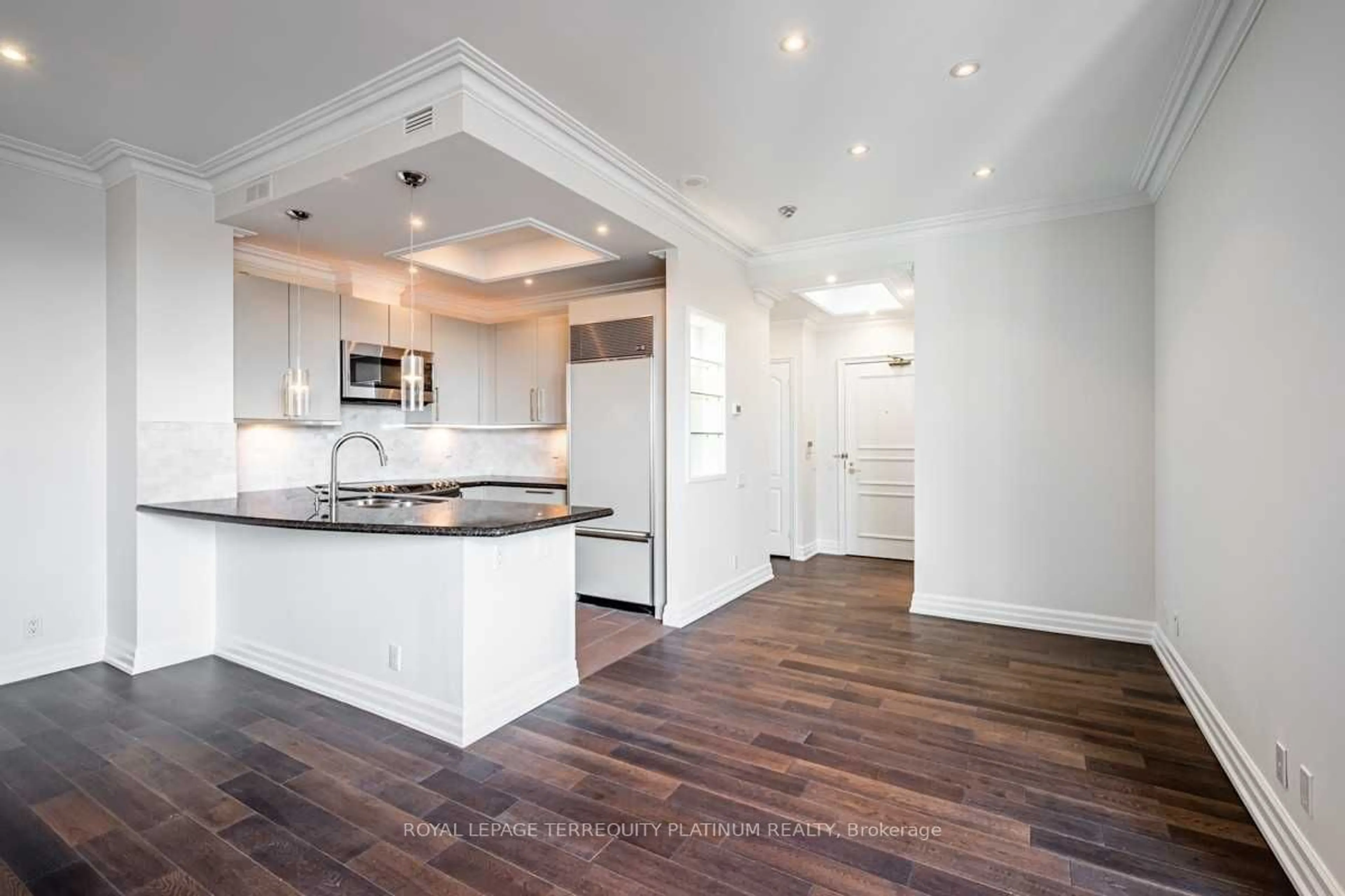 Open concept kitchen, wood/laminate floor for 38 Avenue Rd #902, Toronto Ontario M5R 2G2