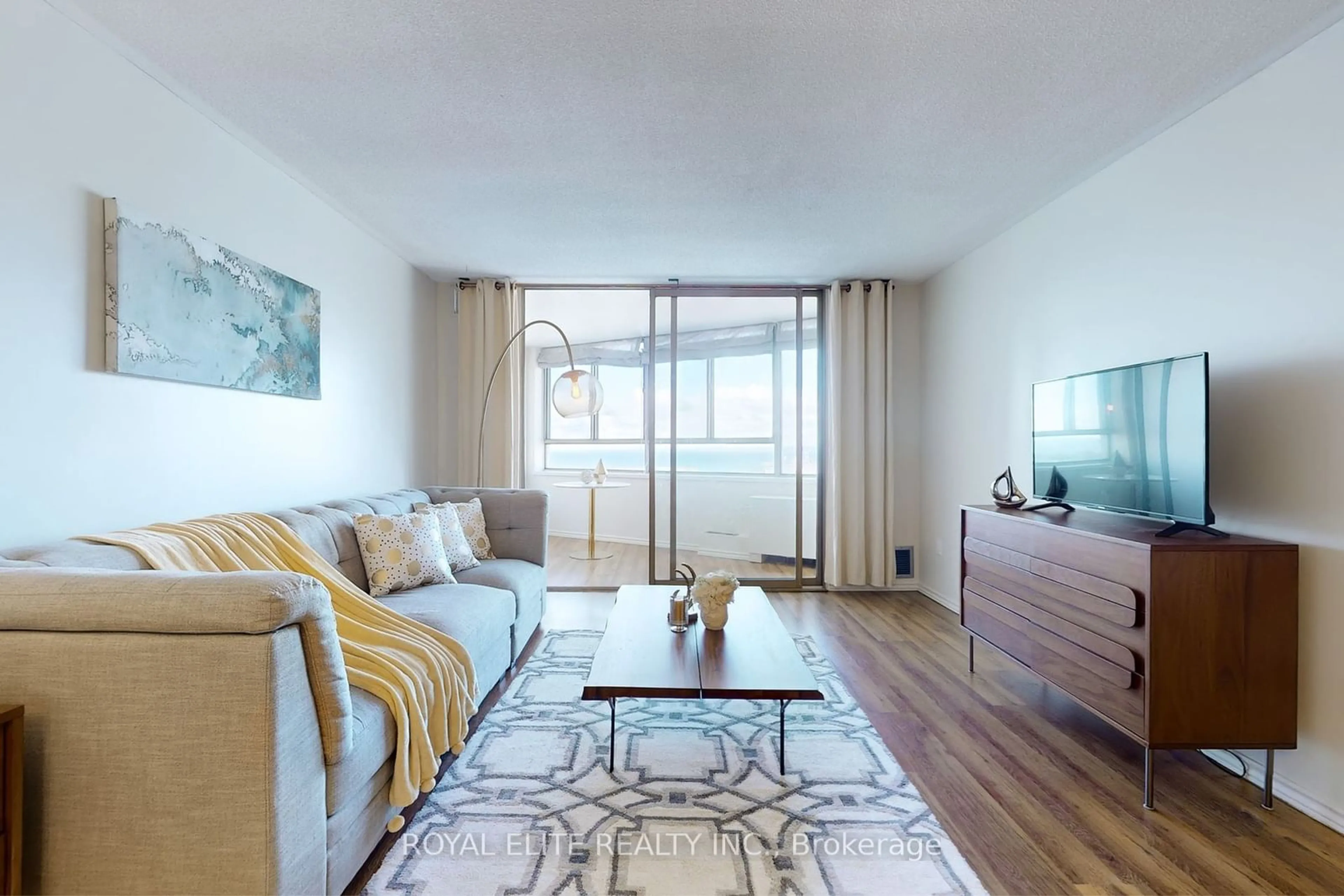 Living room with furniture, wood/laminate floor for 270 Queens Quay #2504, Toronto Ontario M5J 2N4