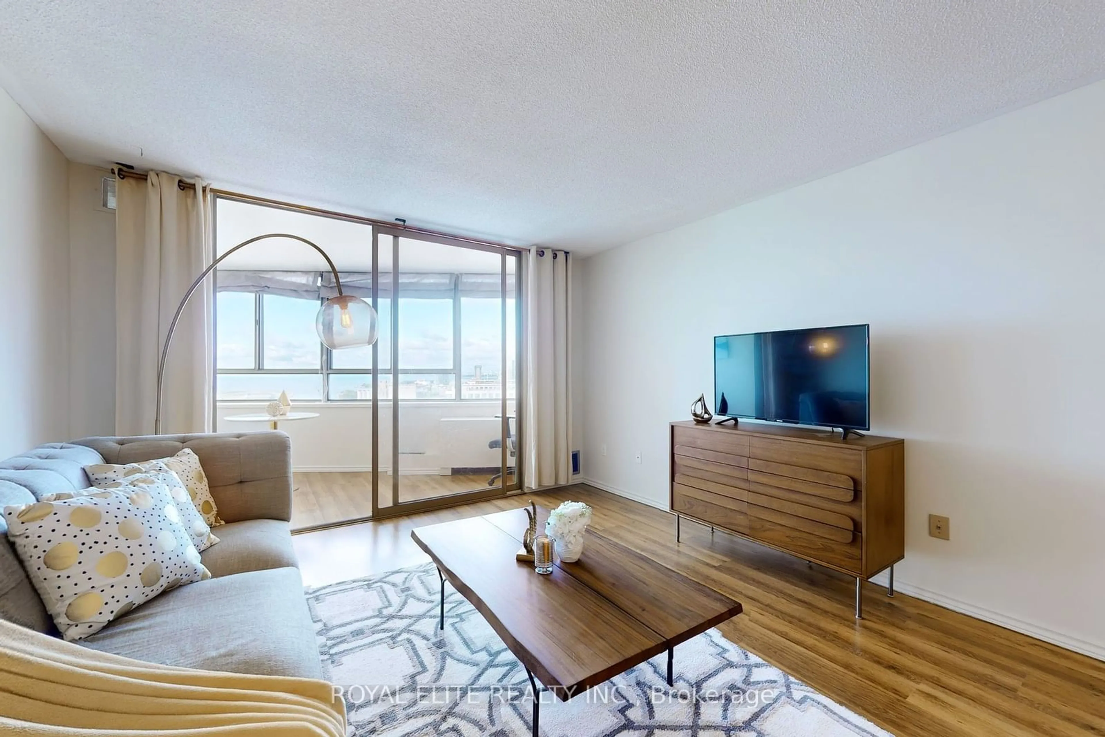 Living room with furniture, wood/laminate floor for 270 Queens Quay #2504, Toronto Ontario M5J 2N4