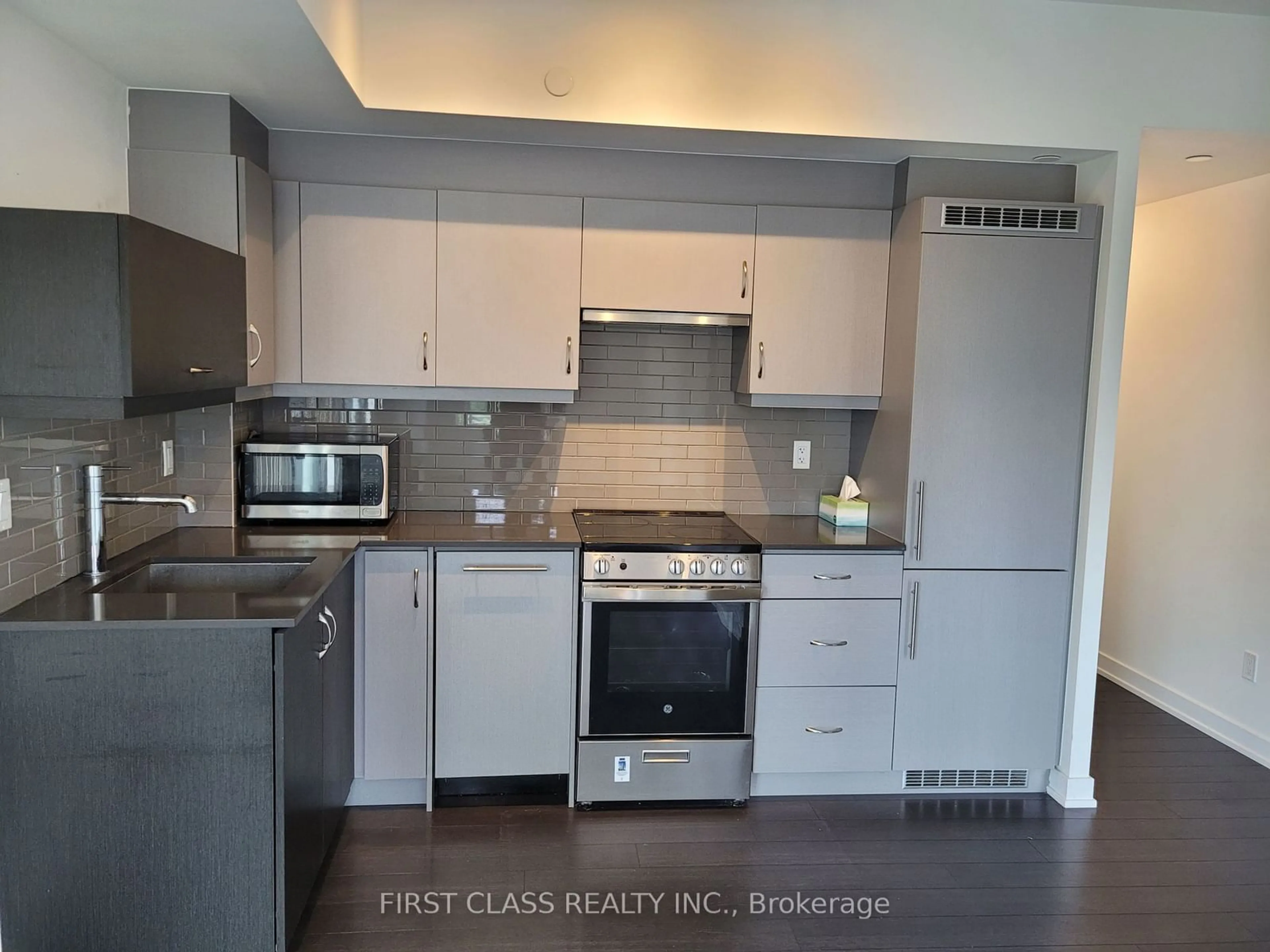 Open concept kitchen, unknown for 181 Huron St #202, Toronto Ontario M5T 0C1