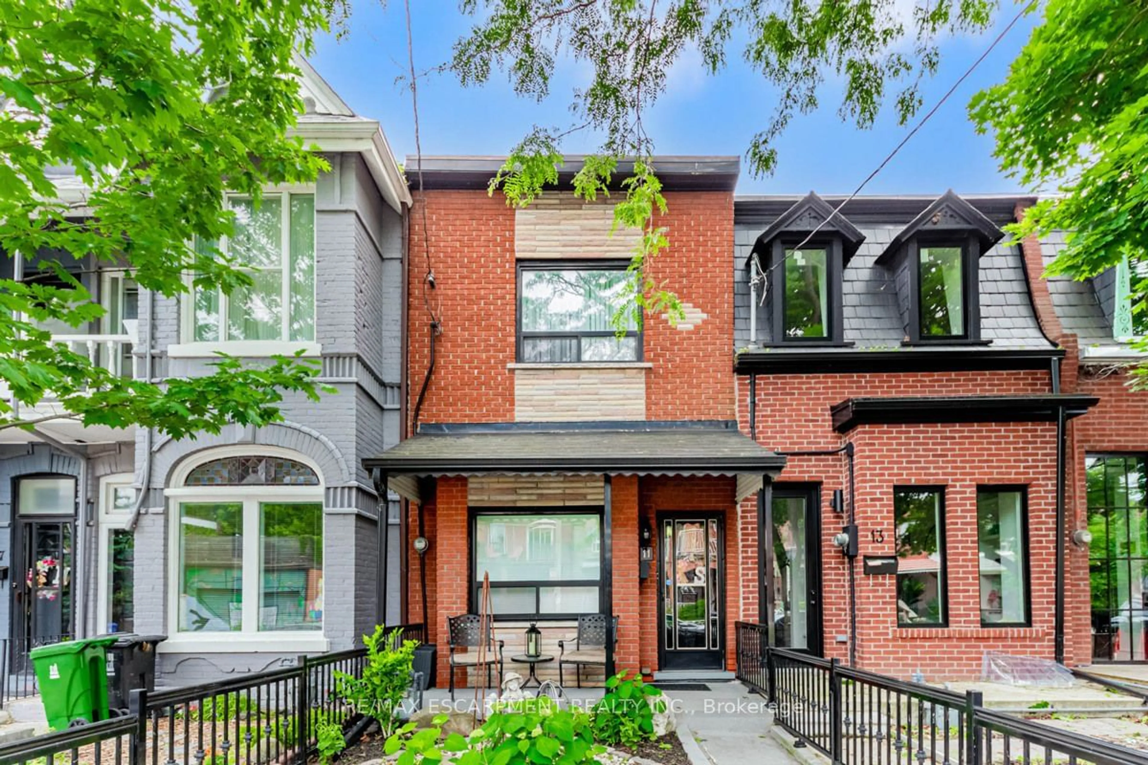 Home with brick exterior material, street for 11 Alma Ave, Toronto Ontario M6J 1N2