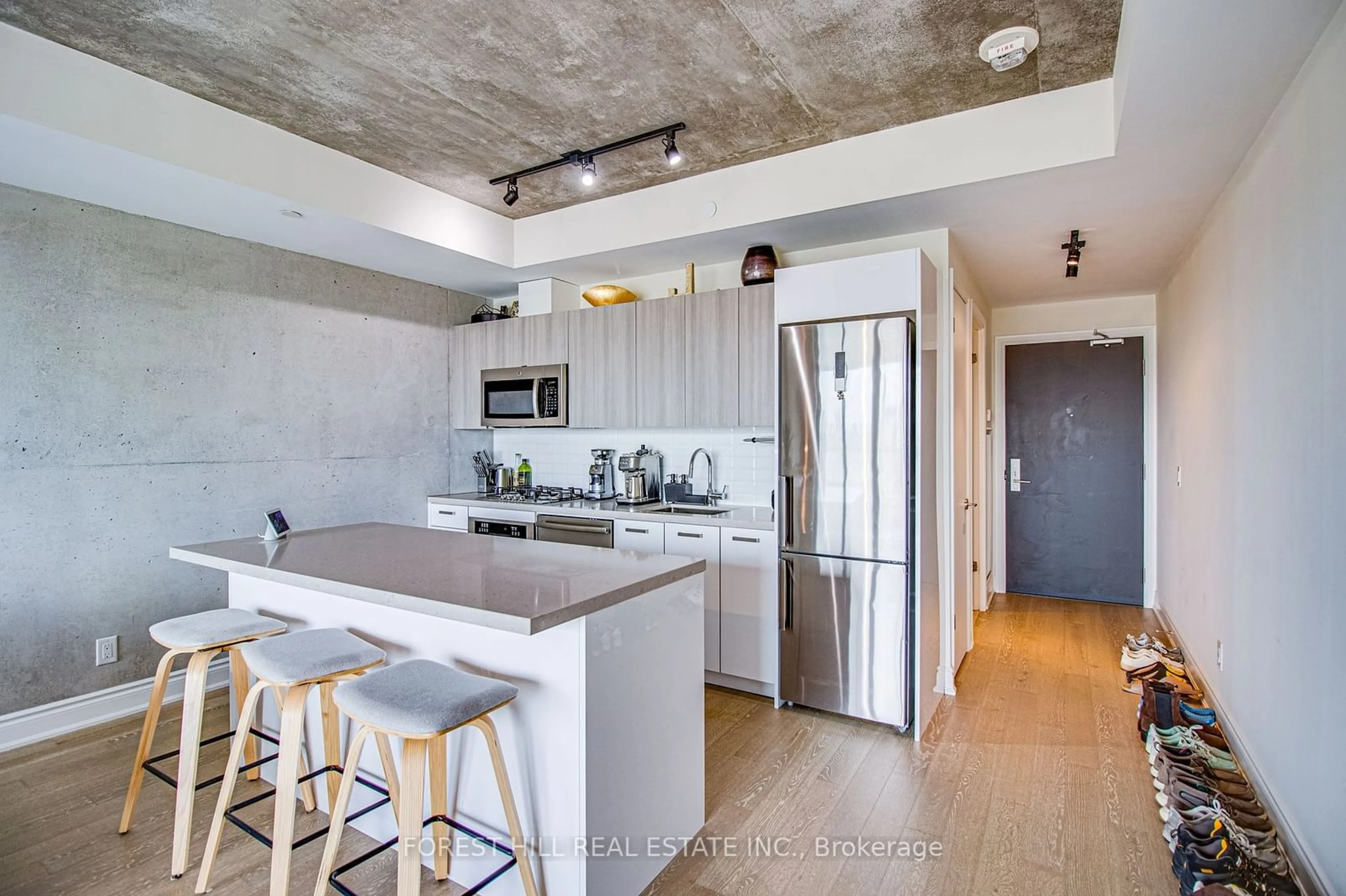 Open concept kitchen, cement floor for 608 Richmond St #1208, Toronto Ontario M5V 0N9