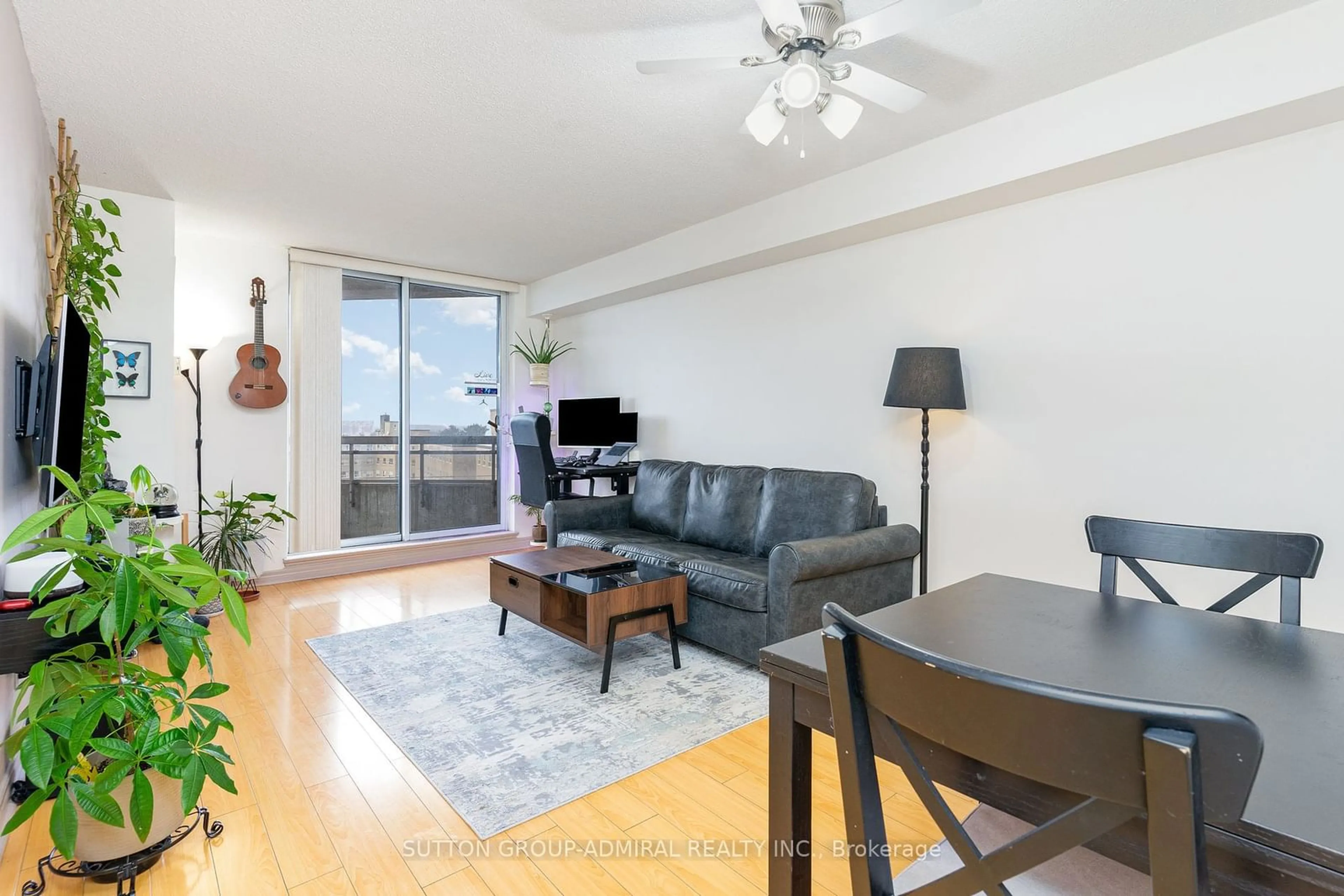 Living room with furniture, wood/laminate floor for 1700 Eglinton Ave #618, Toronto Ontario M4A 2X4