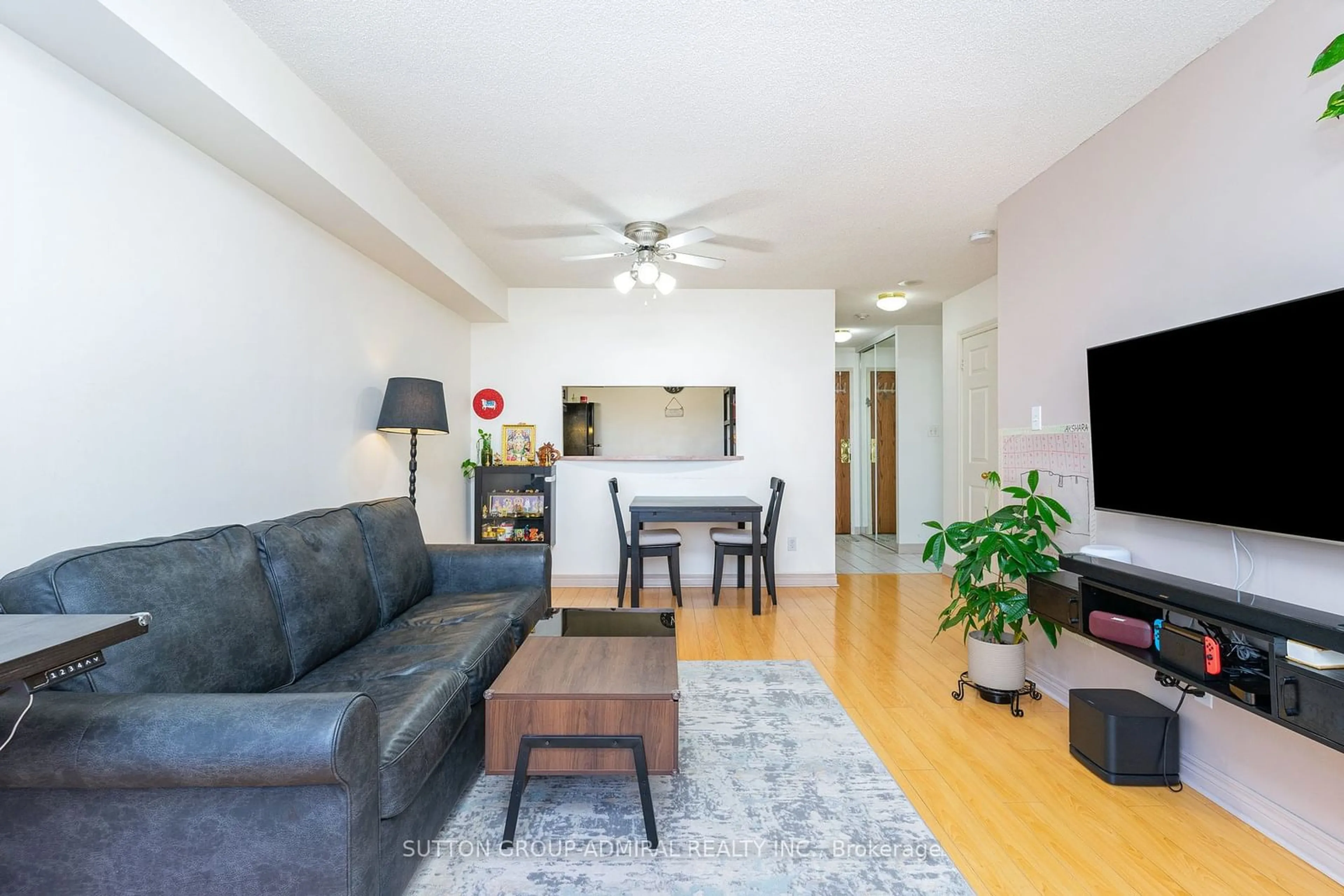 Living room with furniture, wood/laminate floor for 1700 Eglinton Ave #618, Toronto Ontario M4A 2X4