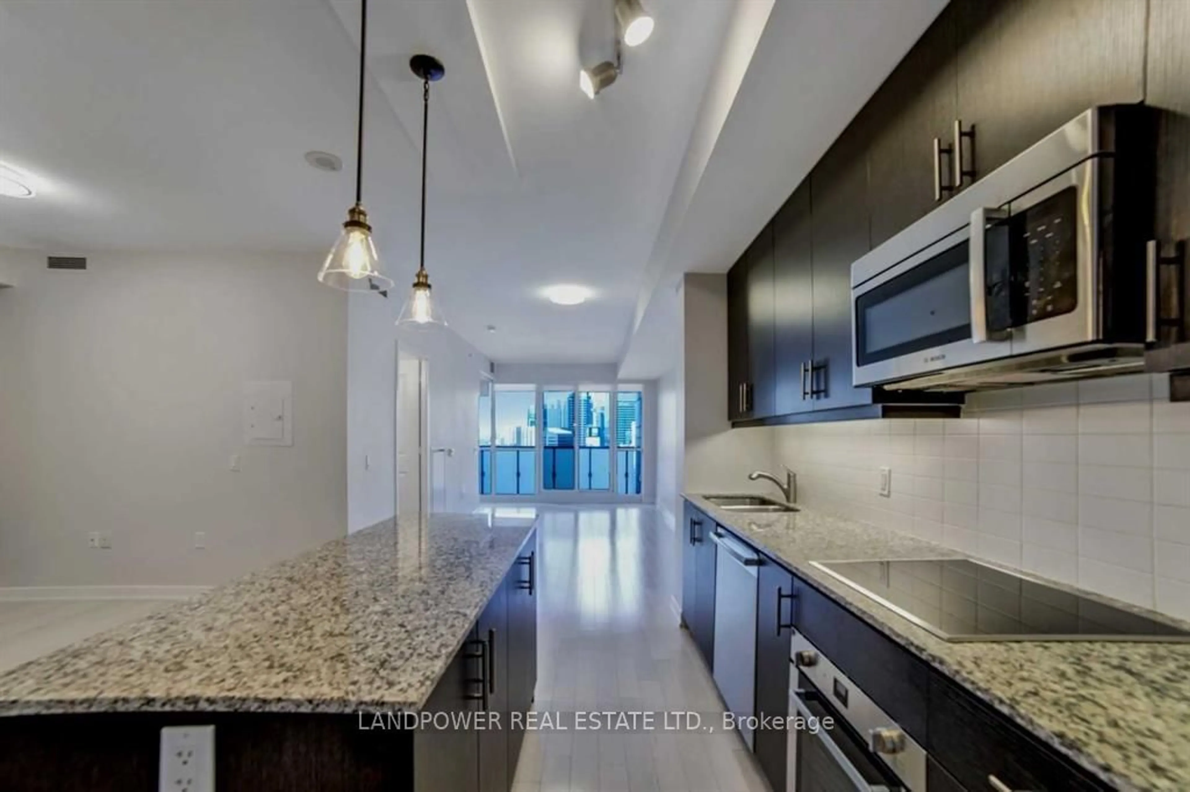 Open concept kitchen, ceramic/tile floor for 1 The Esplanade #2403, Toronto Ontario M5E 0A8