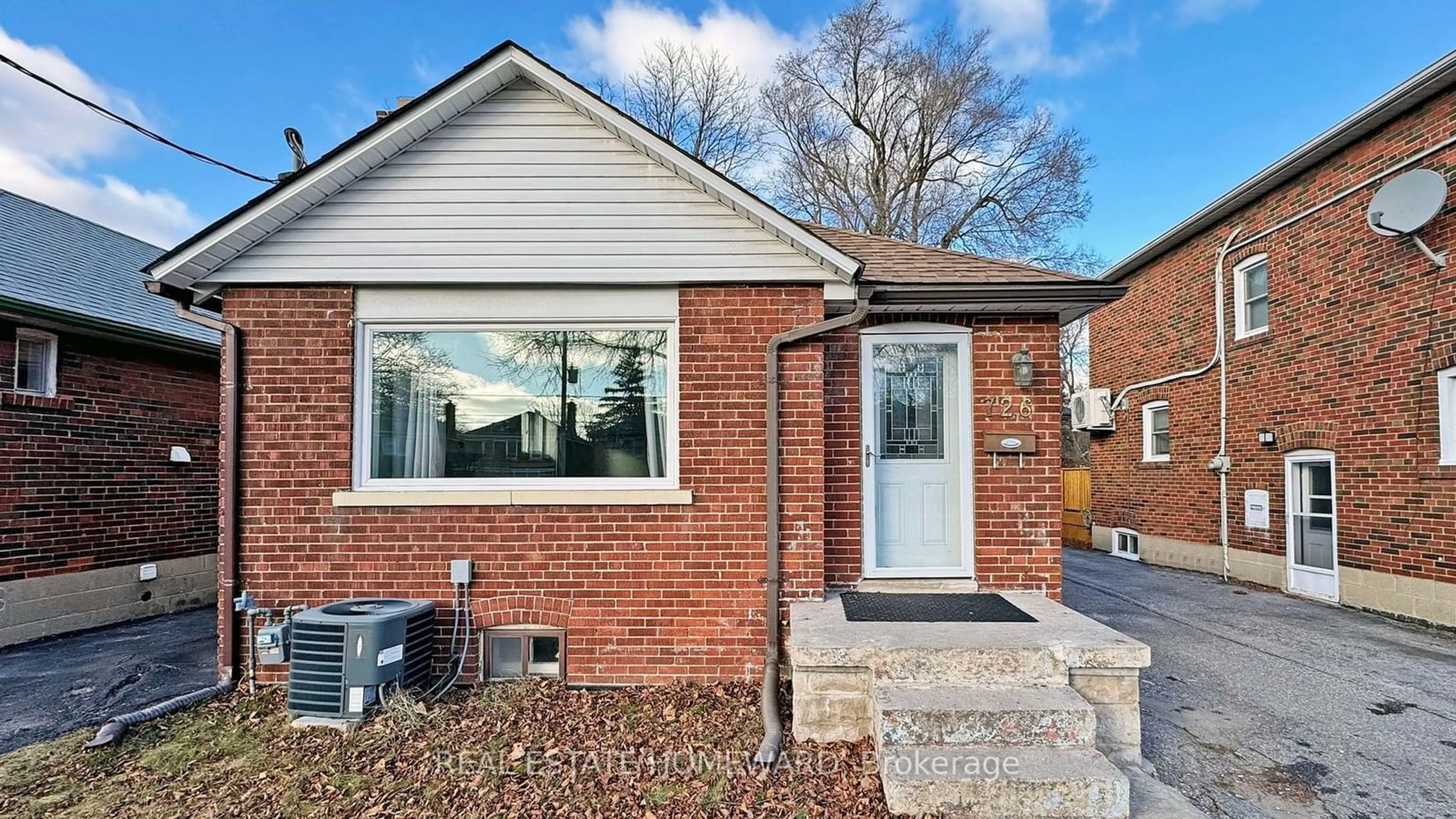 Home with brick exterior material, street for 726 Eglinton Ave, Toronto Ontario M4G 2K7