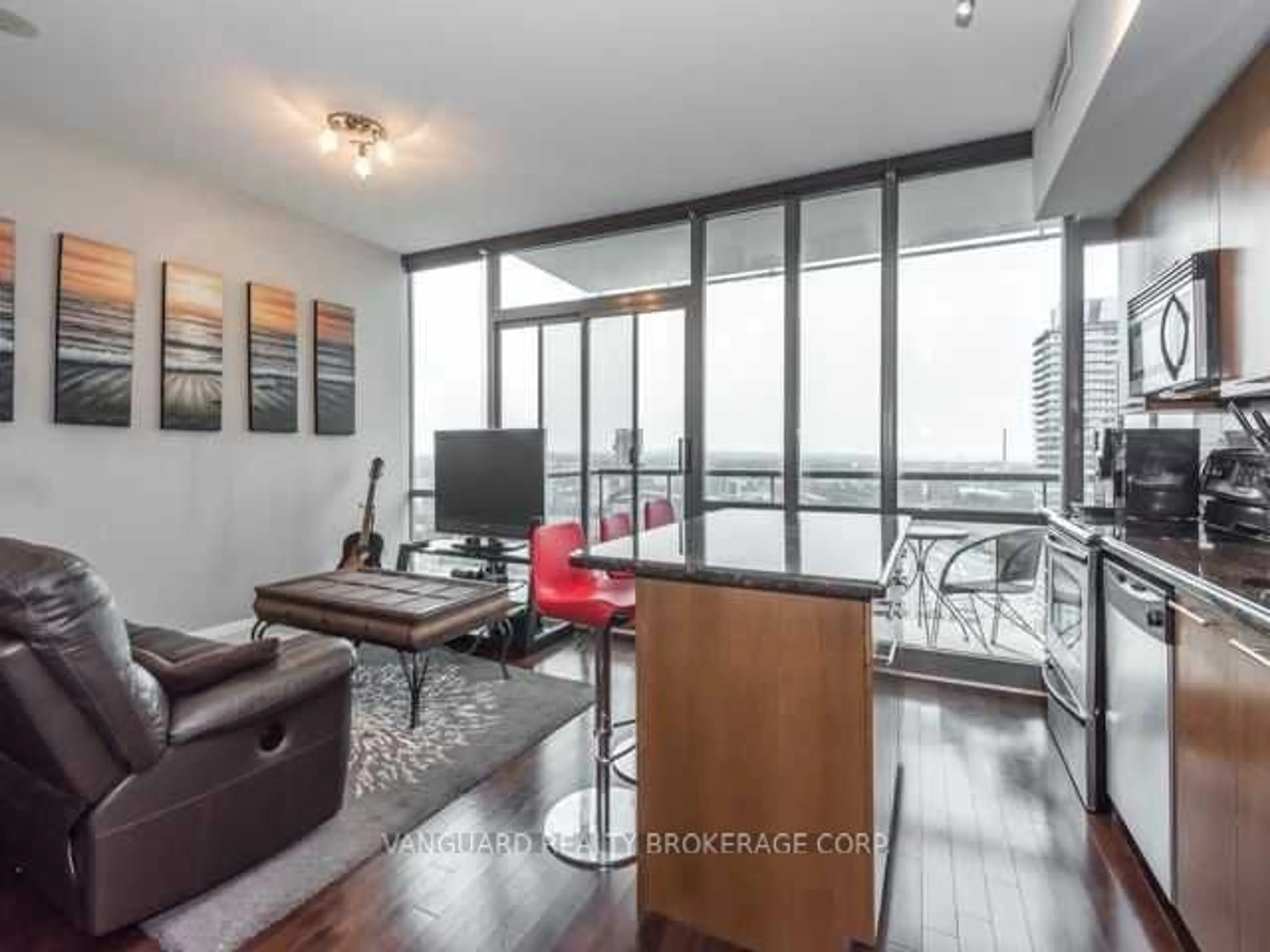 Living room with furniture, wood/laminate floor for 33 Mill St #2403, Toronto Ontario M5A 3R3