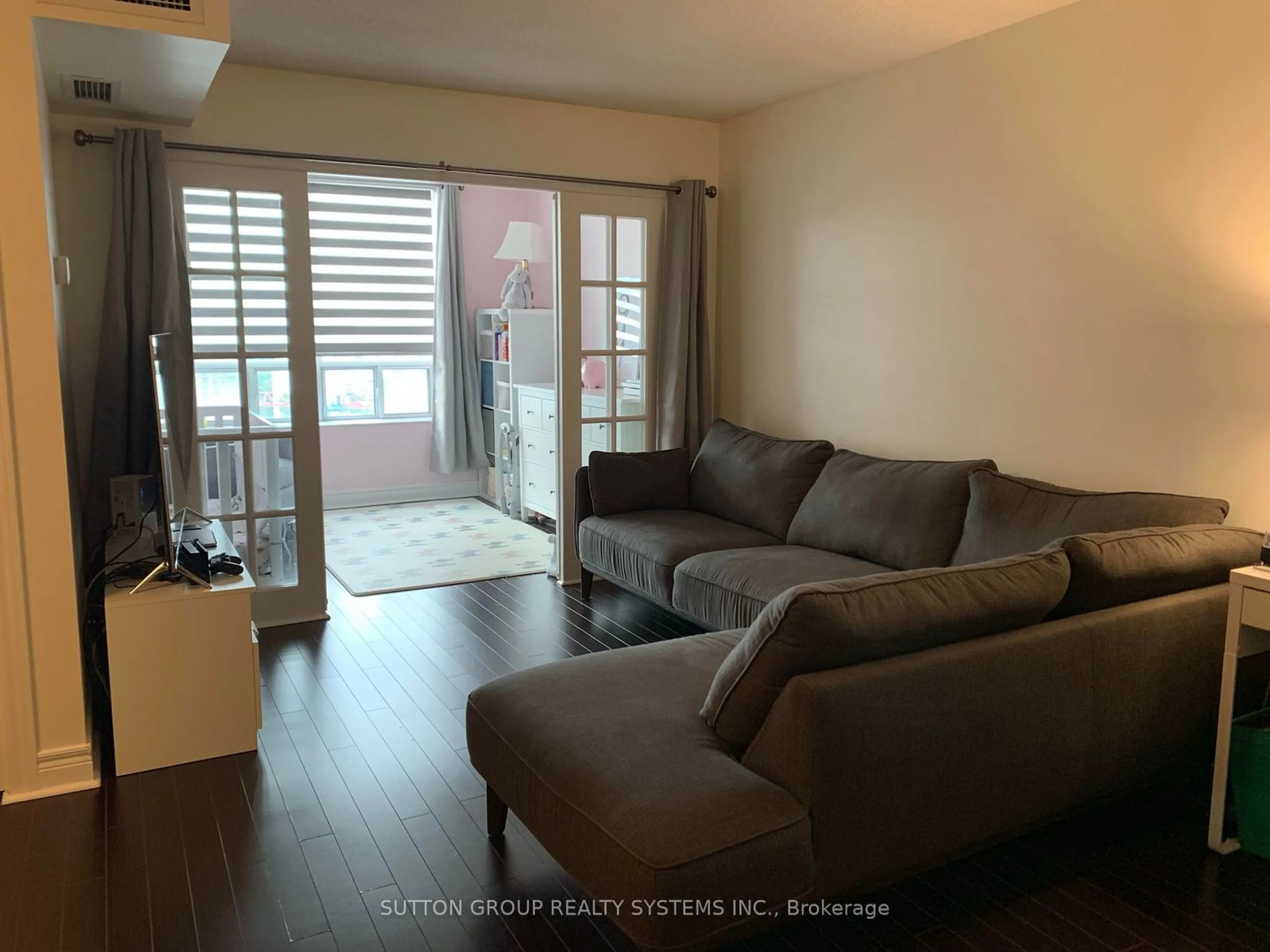 Living room with furniture, wood/laminate floor for 5418 Yonge St #1703, Toronto Ontario M2N 6X4