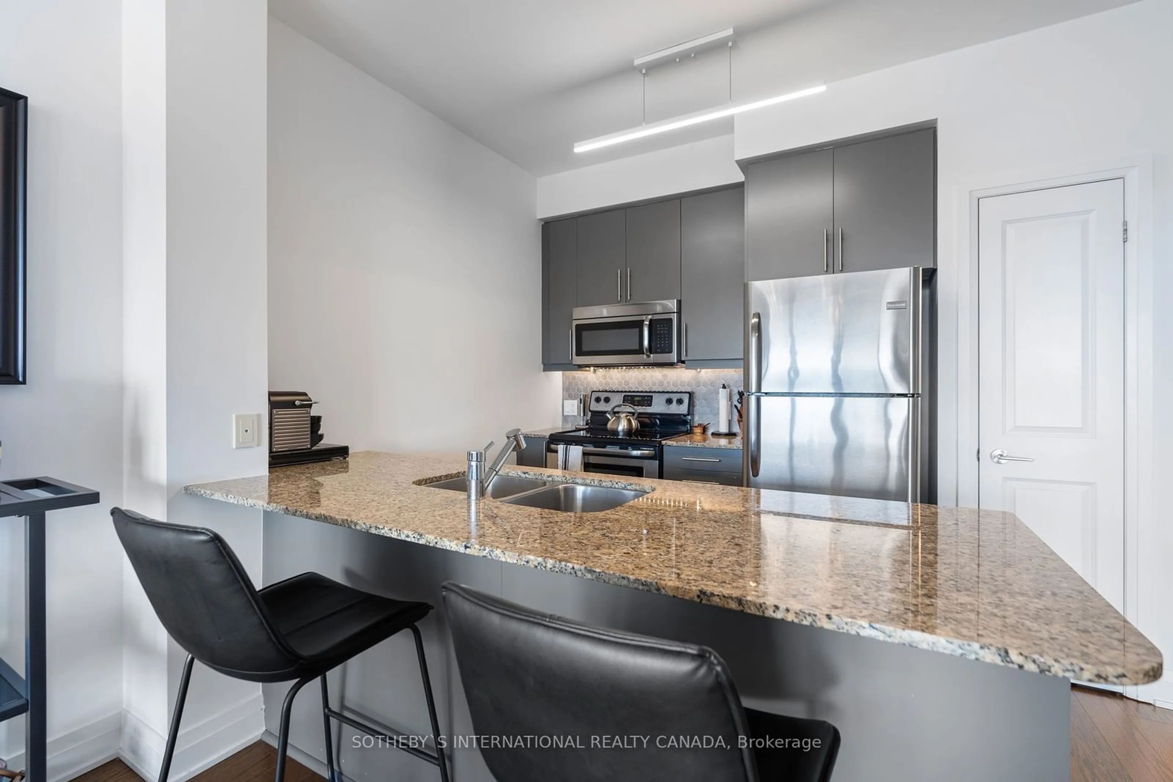 Open concept kitchen, unknown for 530 St Clair Ave #1009, Toronto Ontario M6C 1A2