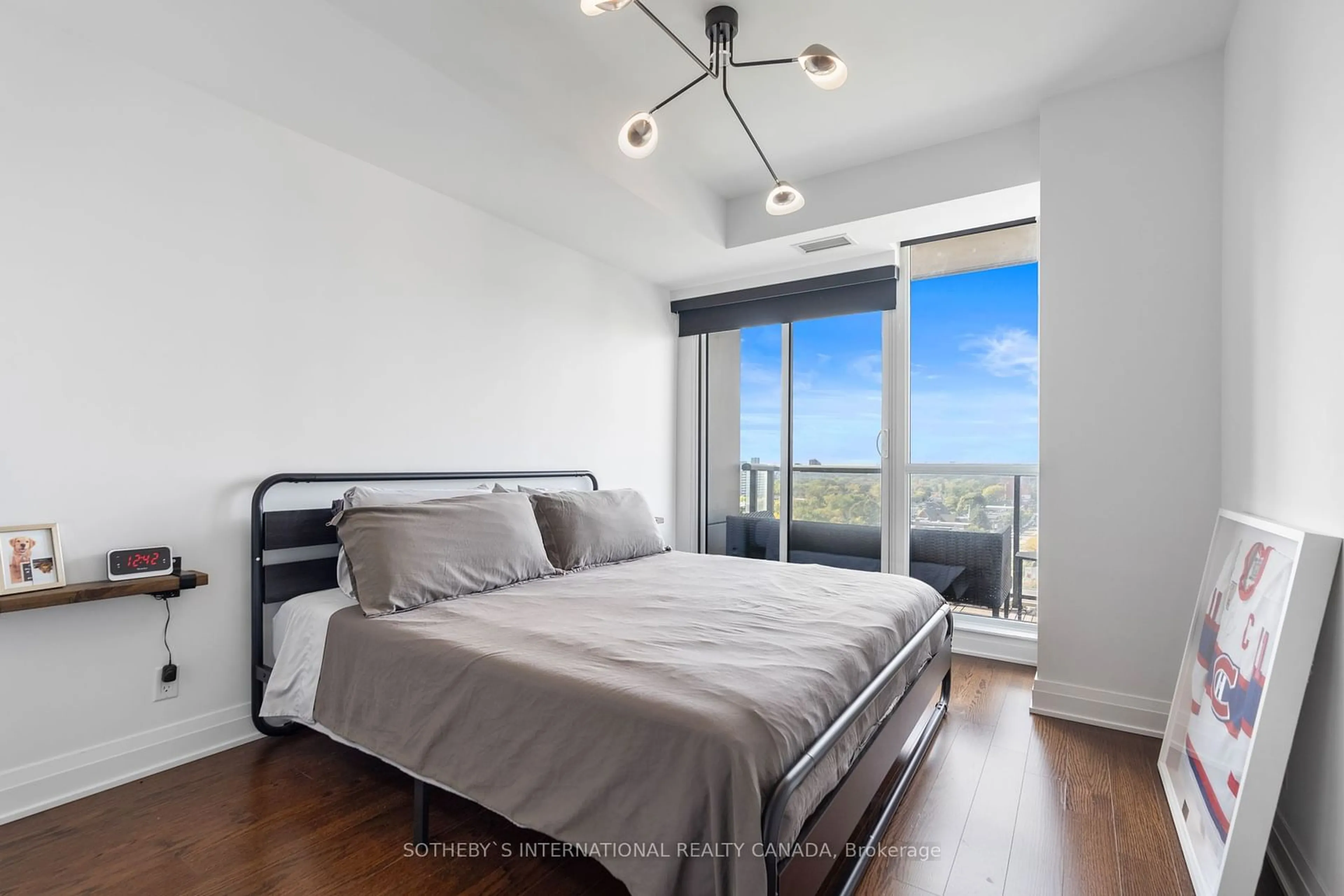 Bedroom with bed, wood/laminate floor for 530 St Clair Ave #1009, Toronto Ontario M6C 1A2