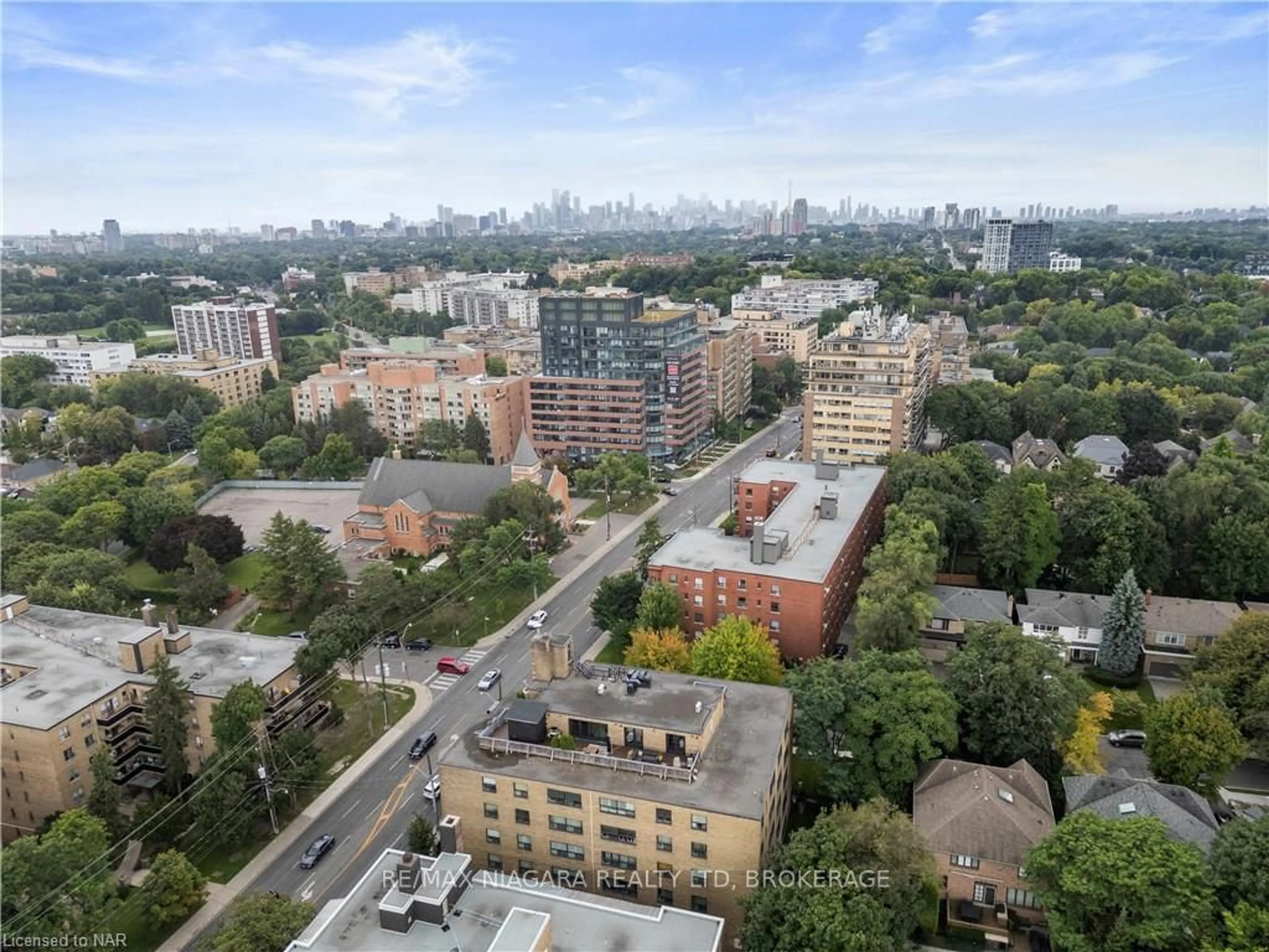 A pic from outside/outdoor area/front of a property/back of a property/a pic from drone, city buildings view from balcony for 2 RIDELLE Ave #505, Toronto Ontario M6B 1H4