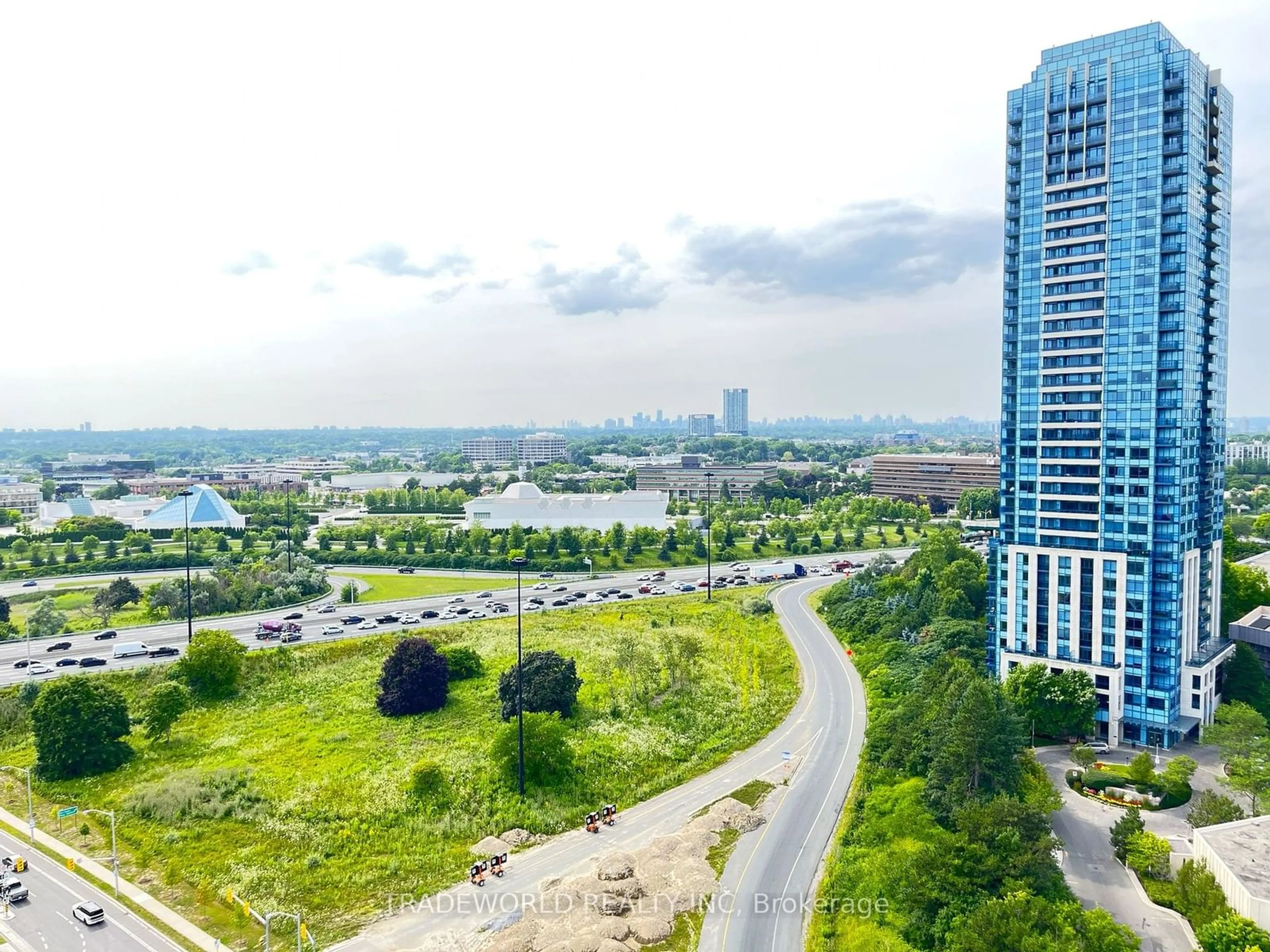 A pic from outside/outdoor area/front of a property/back of a property/a pic from drone, city buildings view from balcony for 215 Wynford Dr #2307, Toronto Ontario M3C 3P5