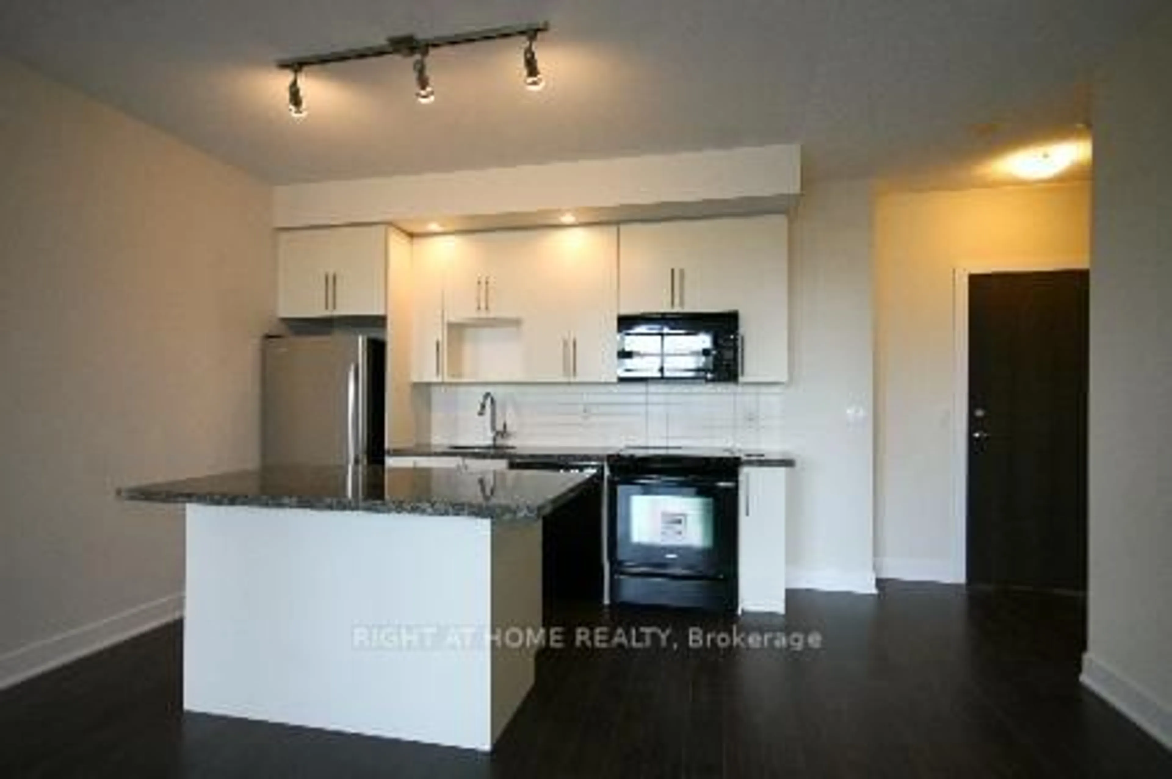 Open concept kitchen, wood/laminate floor for 28 Linden St #1405, Toronto Ontario M4Y 1V6