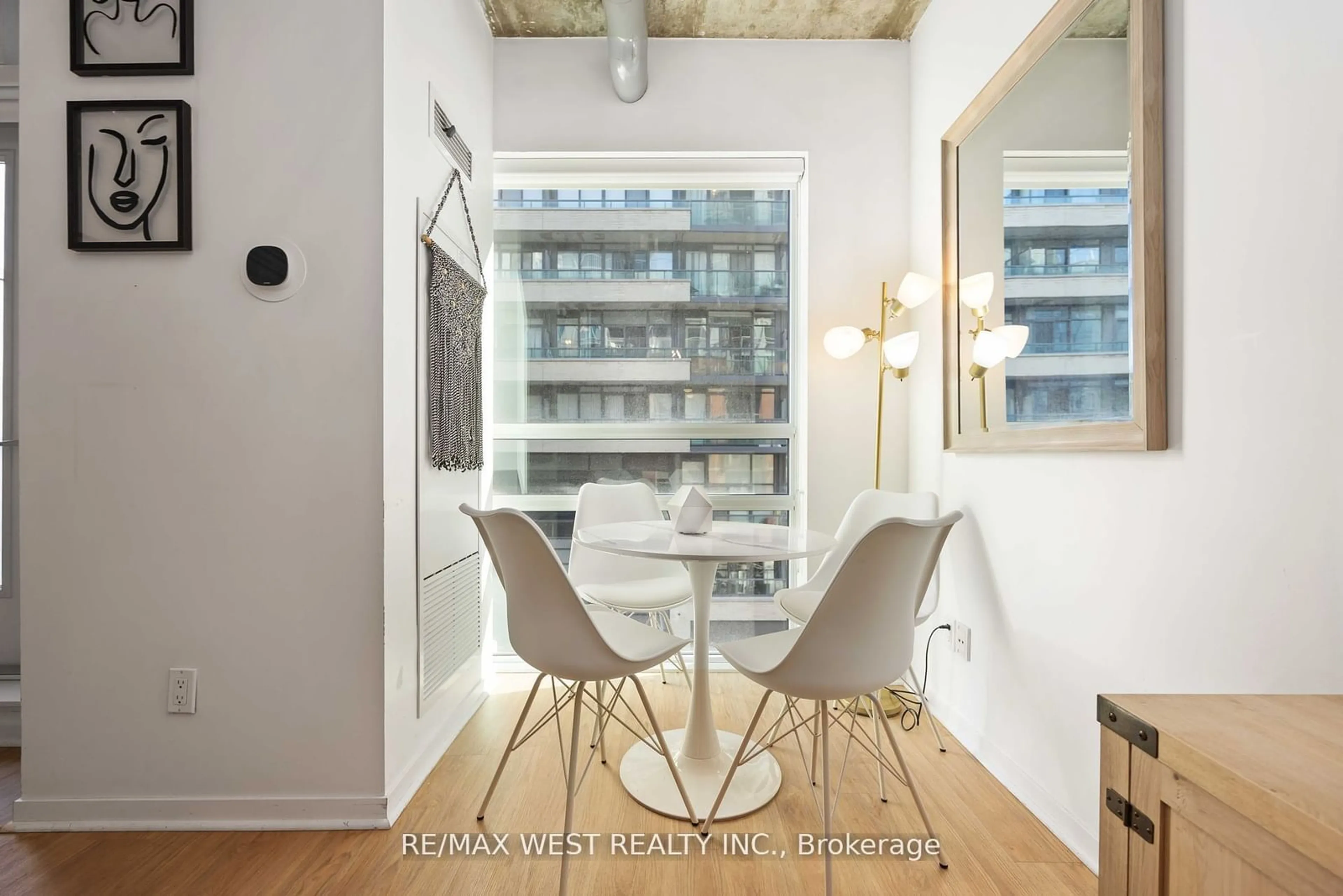 Dining room, wood/laminate floor for 150 Sudbury St #418, Toronto Ontario M6J 3S8