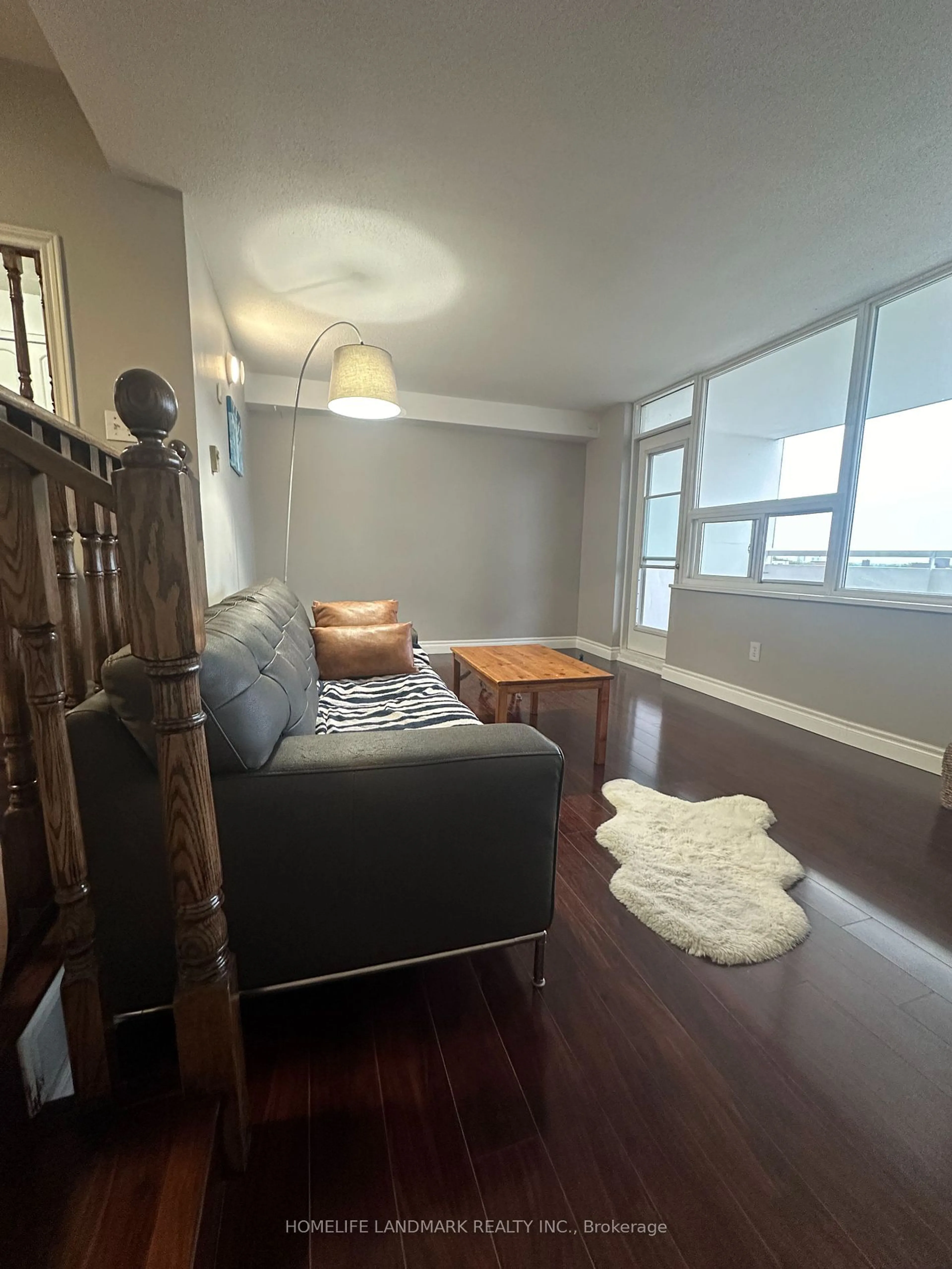 Living room with furniture, wood/laminate floor for 1360 York Mills Rd #809, Toronto Ontario M3A 2A2