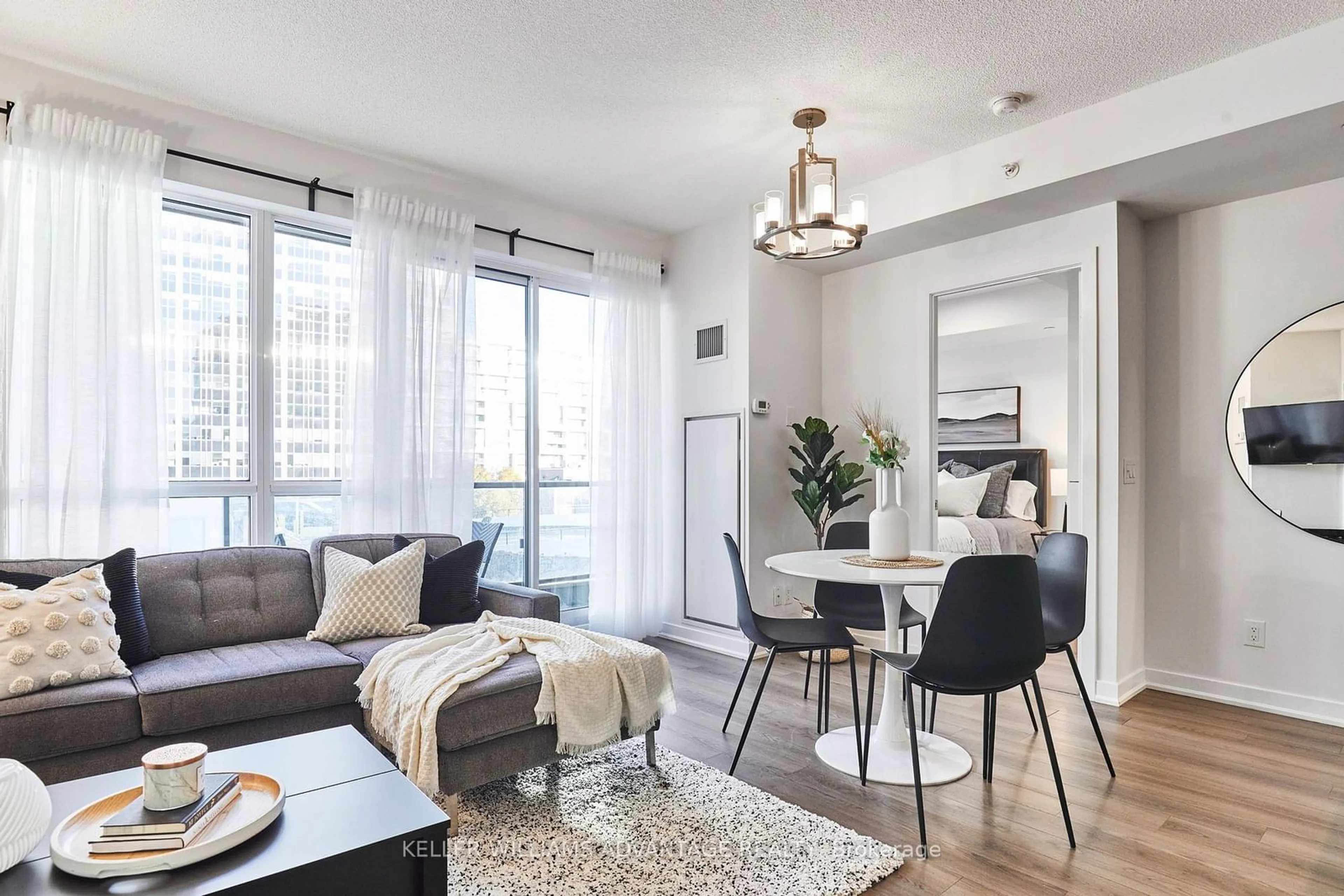 Living room with furniture, wood/laminate floor for 60 Berwick Ave #515, Toronto Ontario M5P 0A3