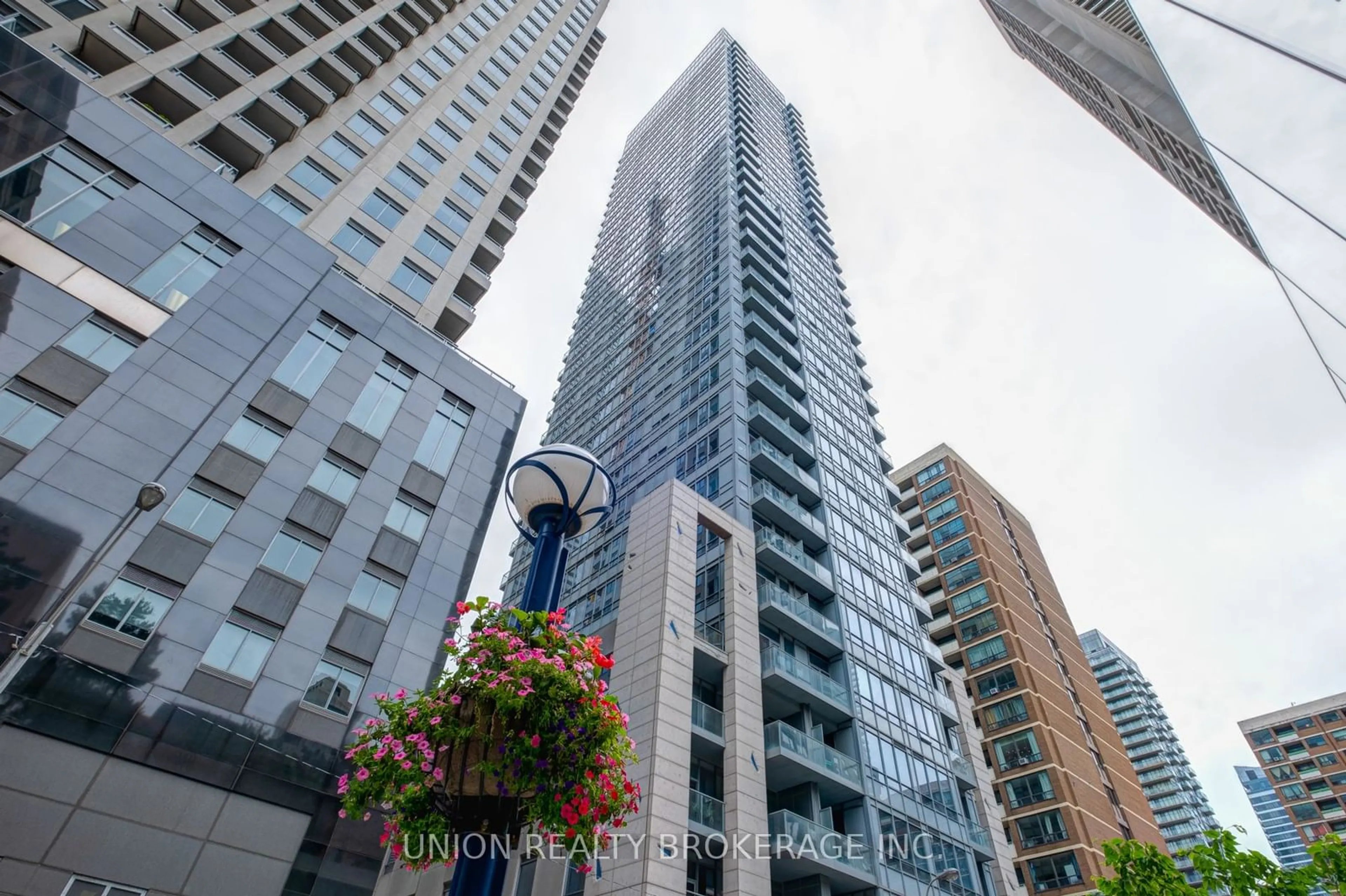 Patio, city buildings view from balcony for 21 Balmuto St #1403, Toronto Ontario M1E 4S4