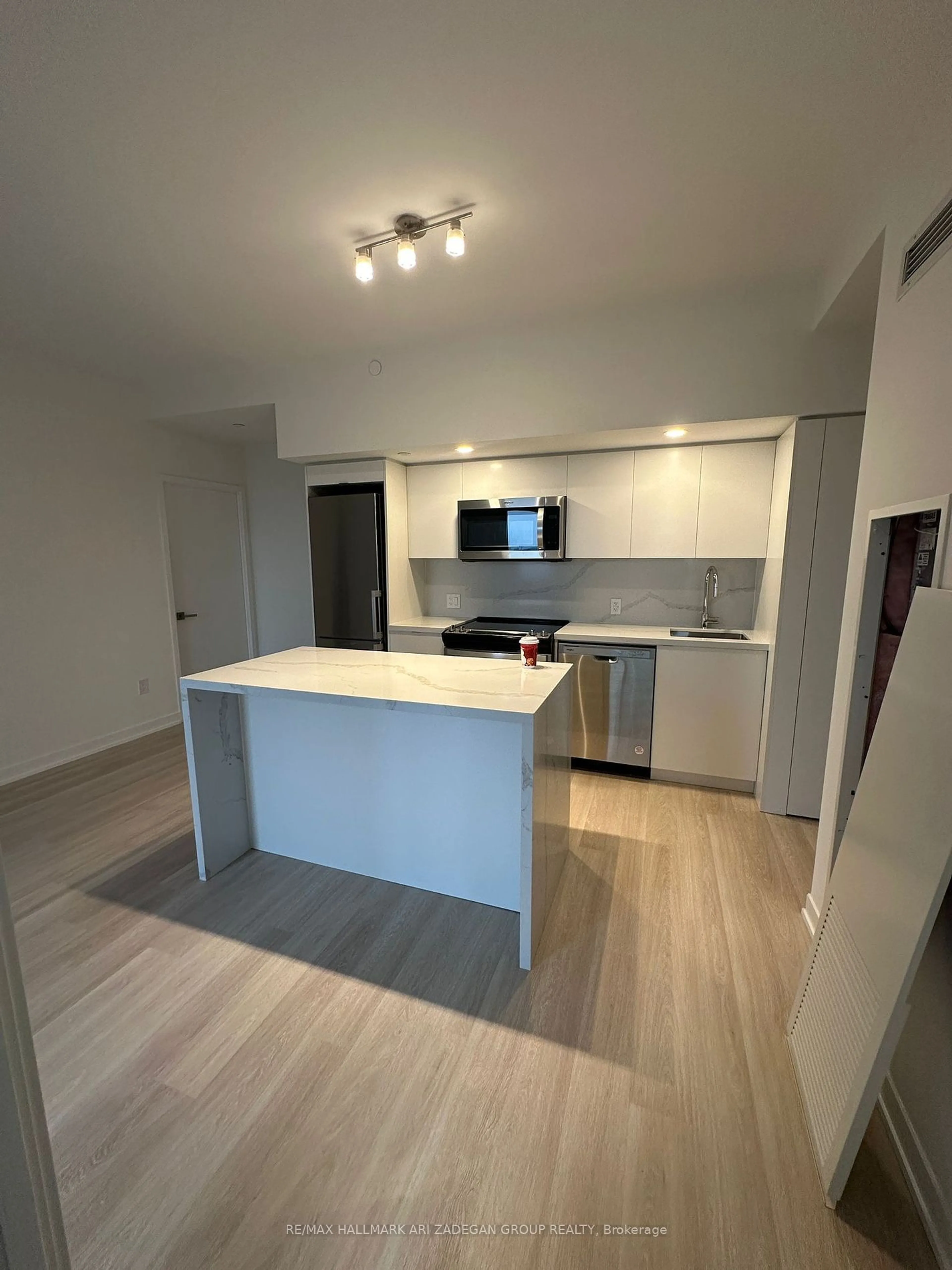 Open concept kitchen, wood/laminate floor for 500 Wilson Ave #*, Toronto Ontario M3H 0E5