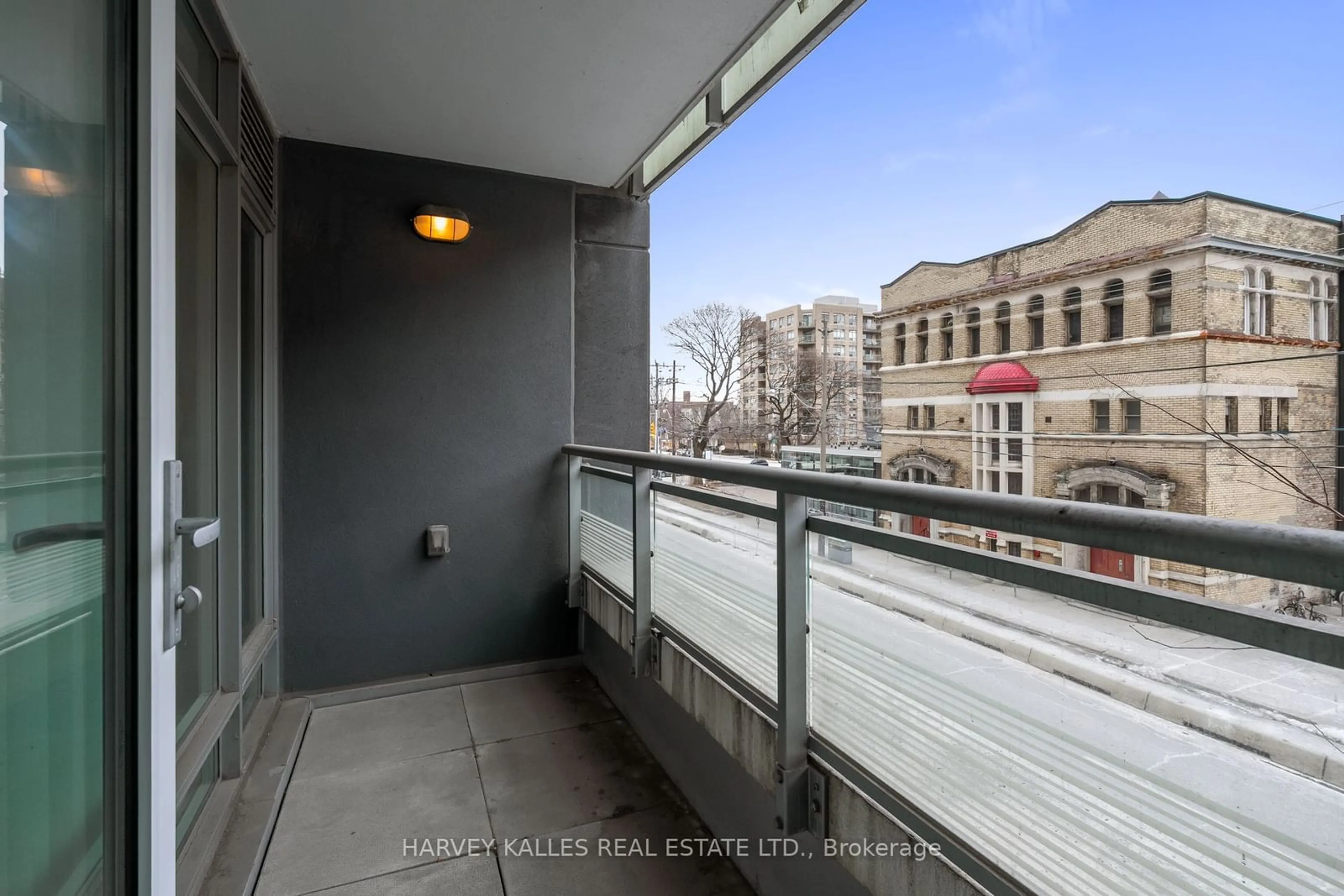 Balcony in the apartment, city buildings view from balcony for 525 Adelaide St #209, Toronto Ontario M5V 0N7