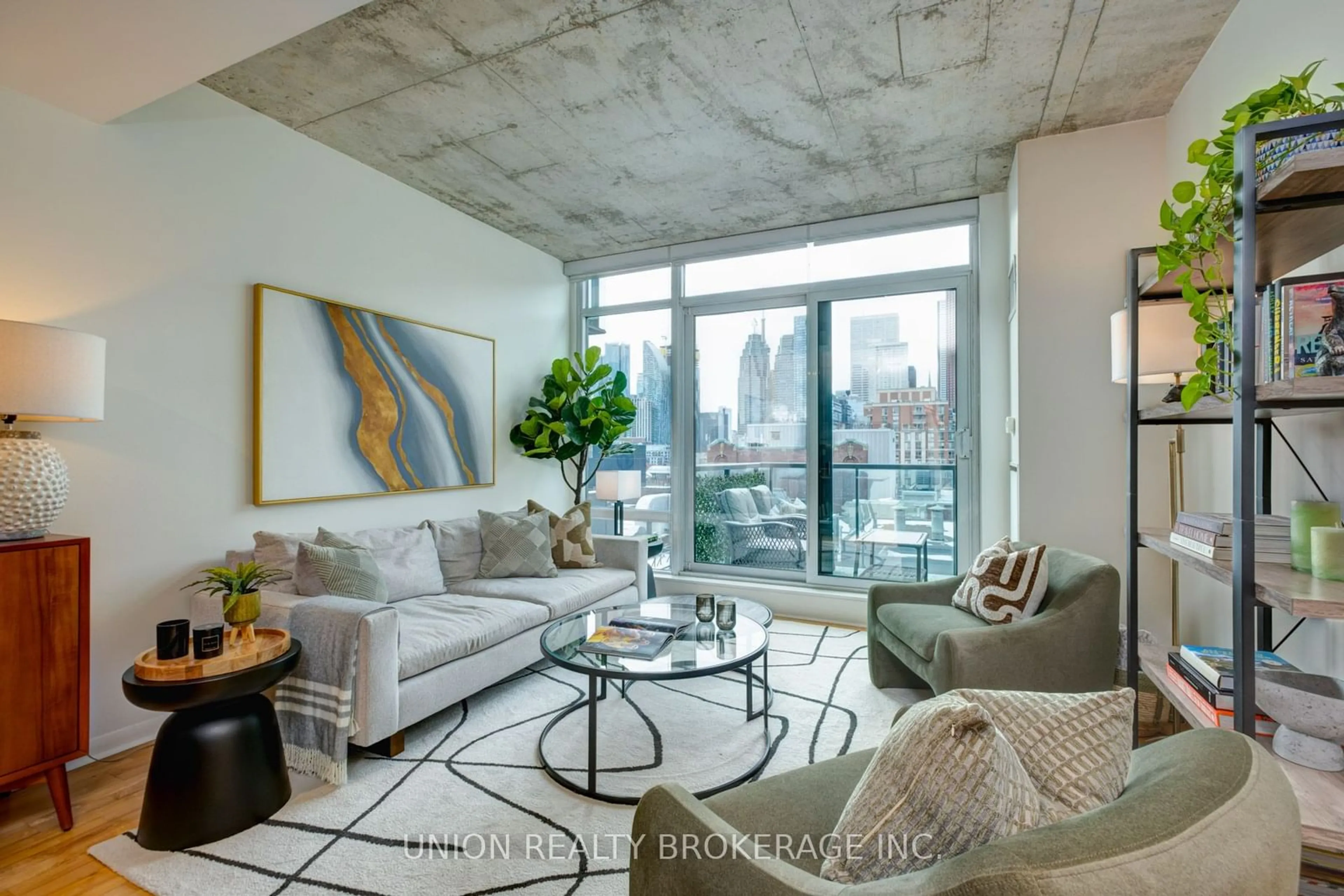 Living room with furniture, cement floor for 333 Adelaide St #1012, Toronto Ontario M5A 4T4