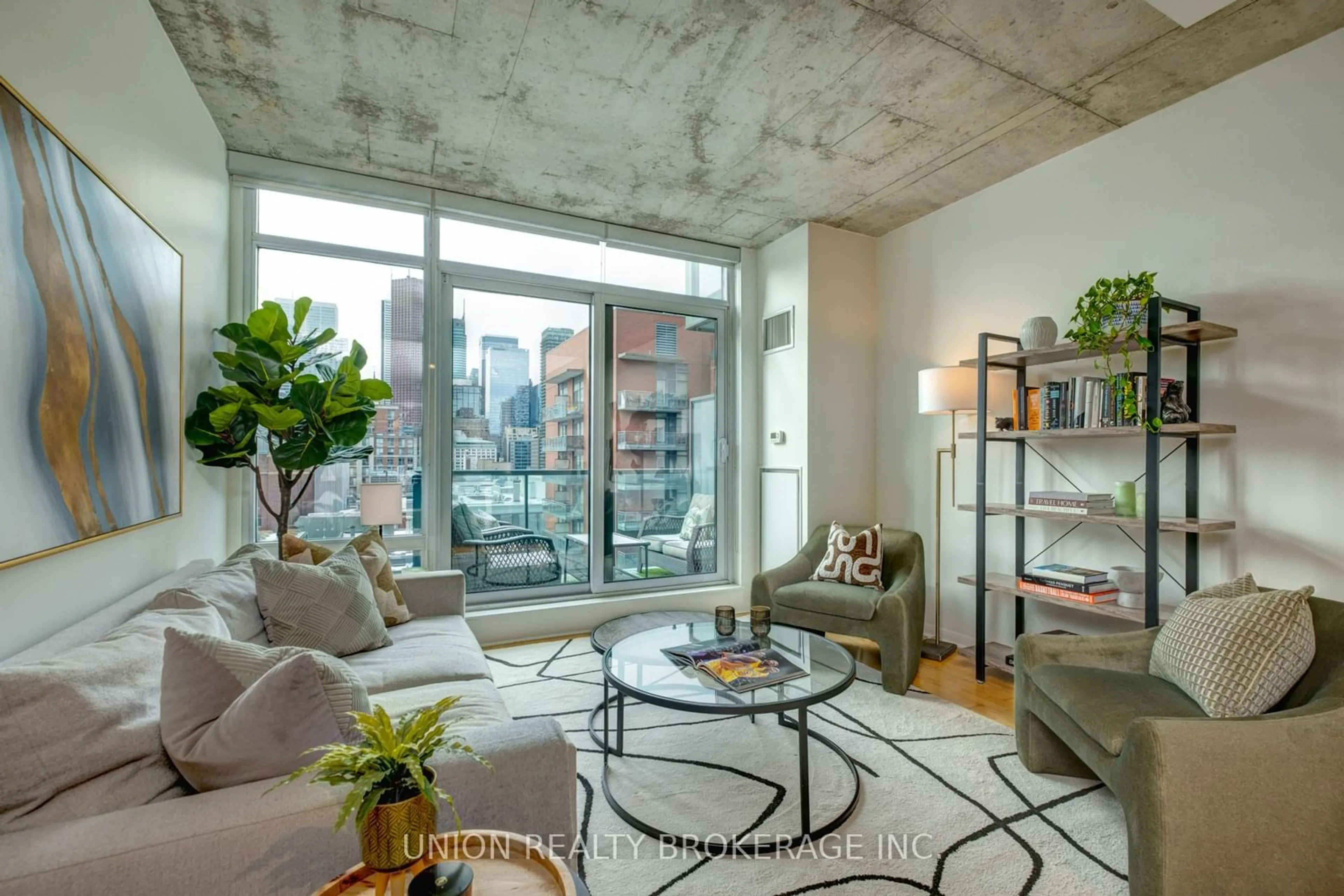 Living room with furniture, cement floor for 333 Adelaide St #1012, Toronto Ontario M5A 4T4