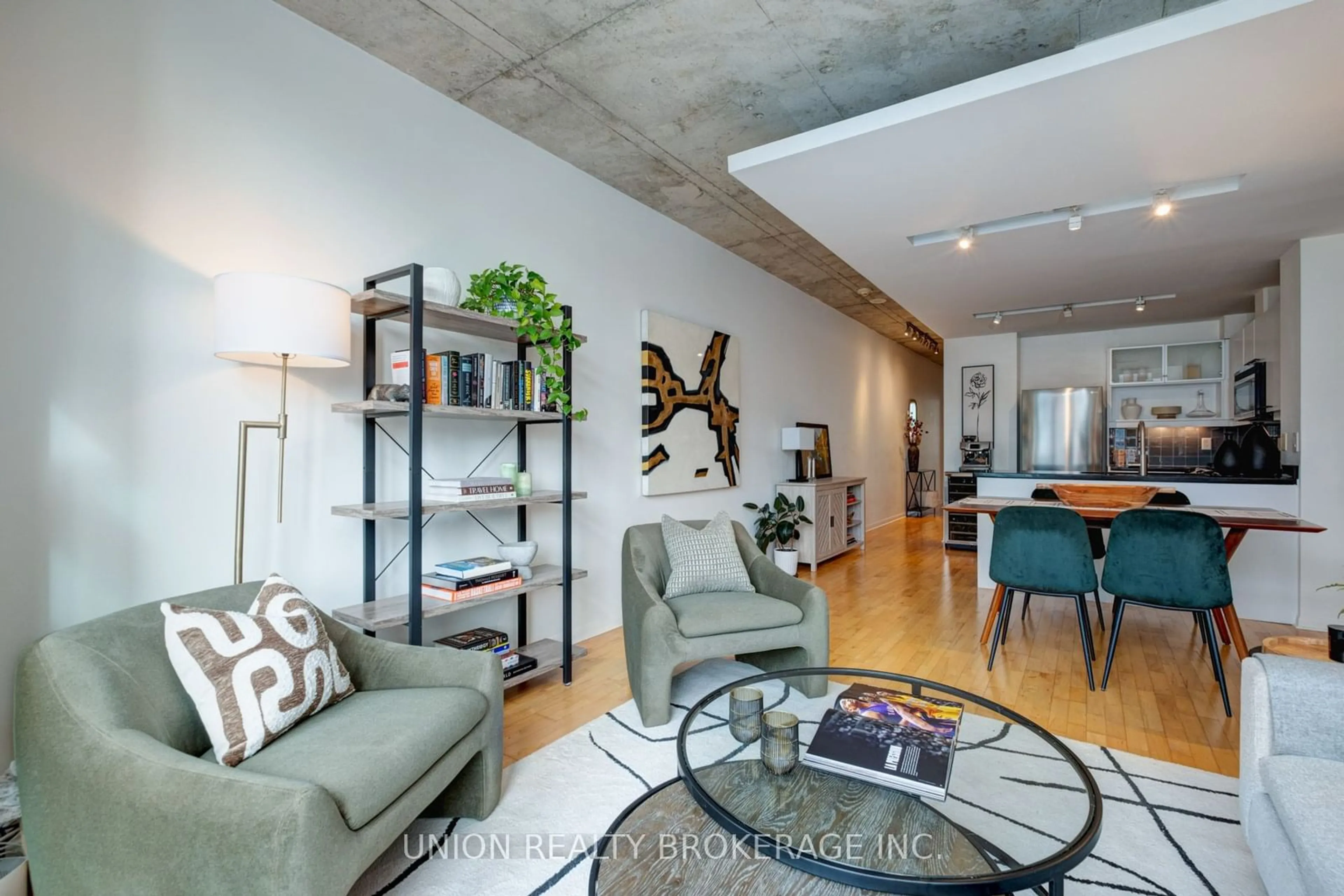 Living room with furniture, cement floor for 333 Adelaide St #1012, Toronto Ontario M5A 4T4