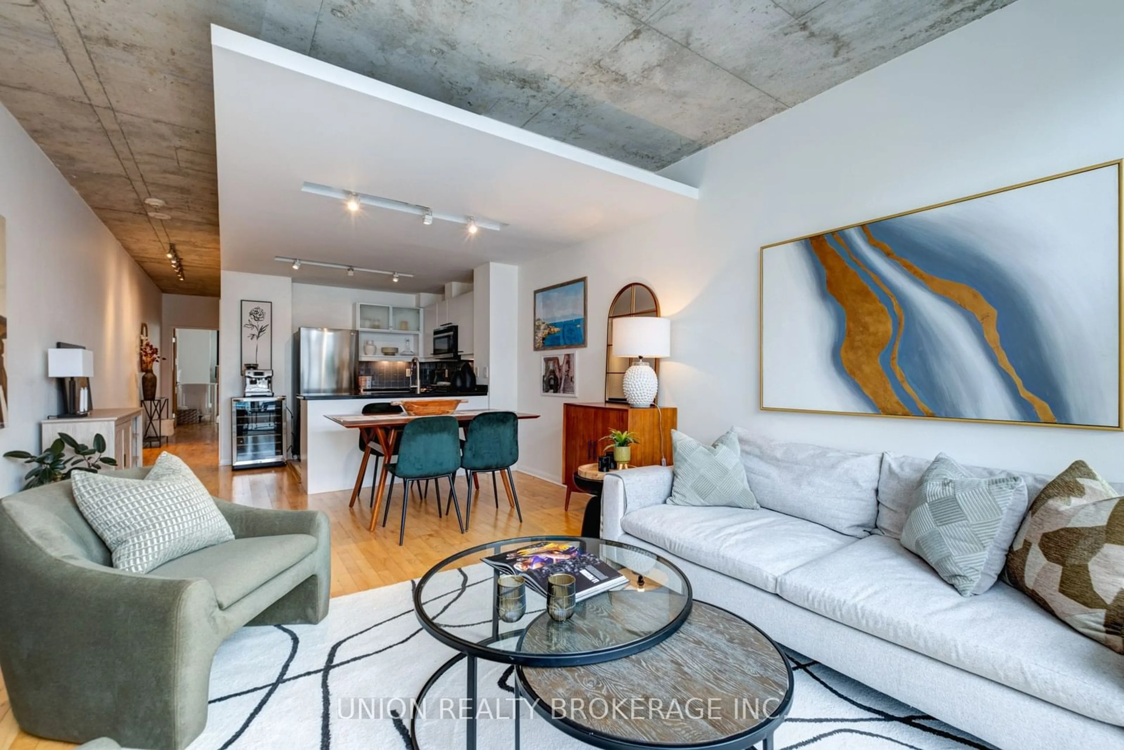 Living room with furniture, cement floor for 333 Adelaide St #1012, Toronto Ontario M5A 4T4