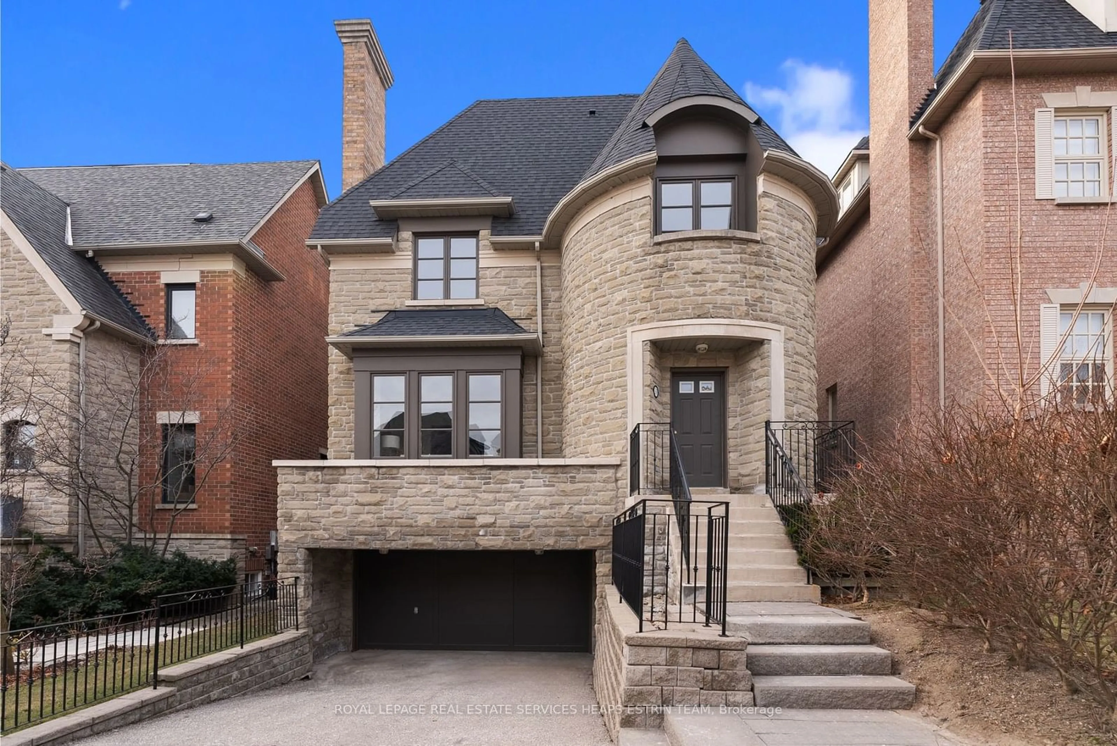 Home with brick exterior material, street for 30 True Davidson Dr, Toronto Ontario M4W 3X5