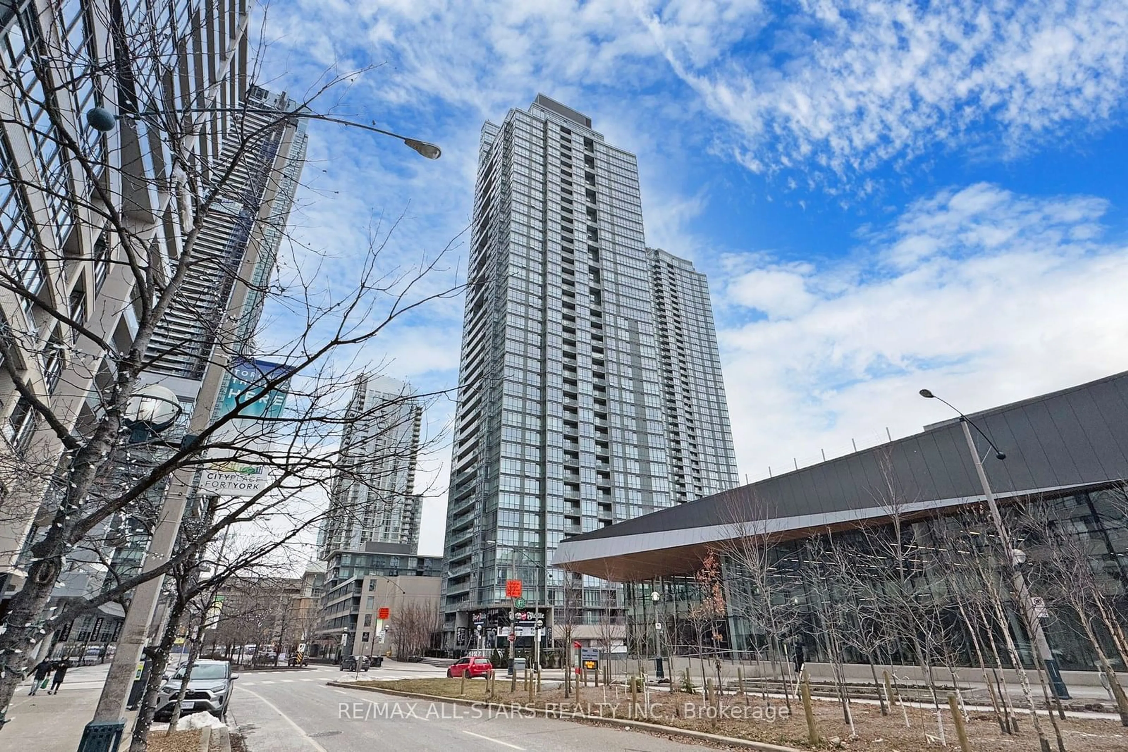 Patio, city buildings view from balcony for 15 Fort York Blvd #4211, Toronto Ontario M5V 3Y4