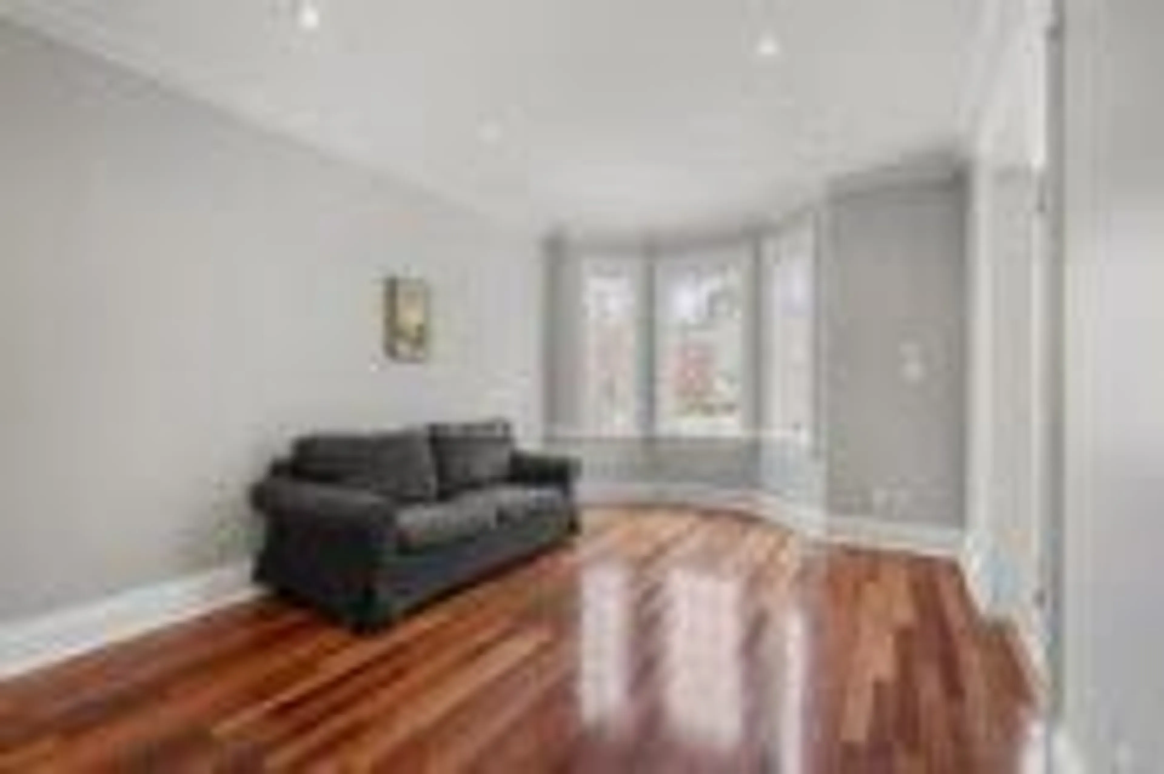 Living room with furniture, wood/laminate floor for 247 Johnston Ave, Toronto Ontario M2N 1H5