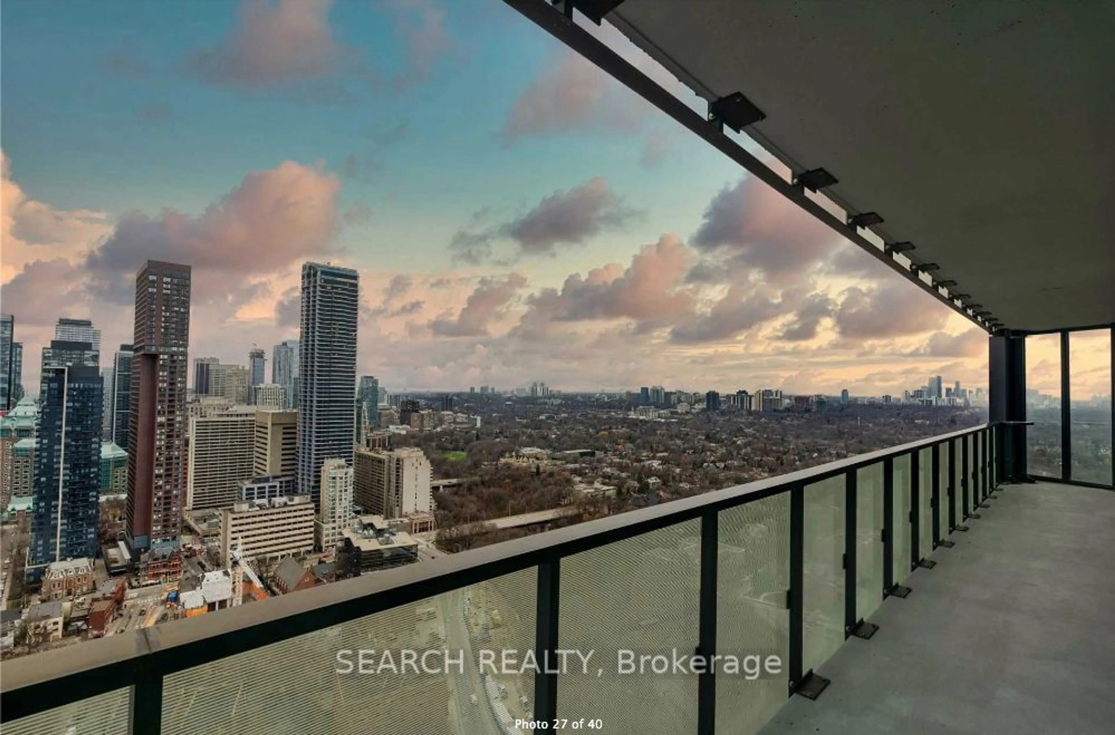 Balcony in the apartment, city buildings view from balcony for 575 Bloor St #1502, Toronto Ontario M4W 0B2